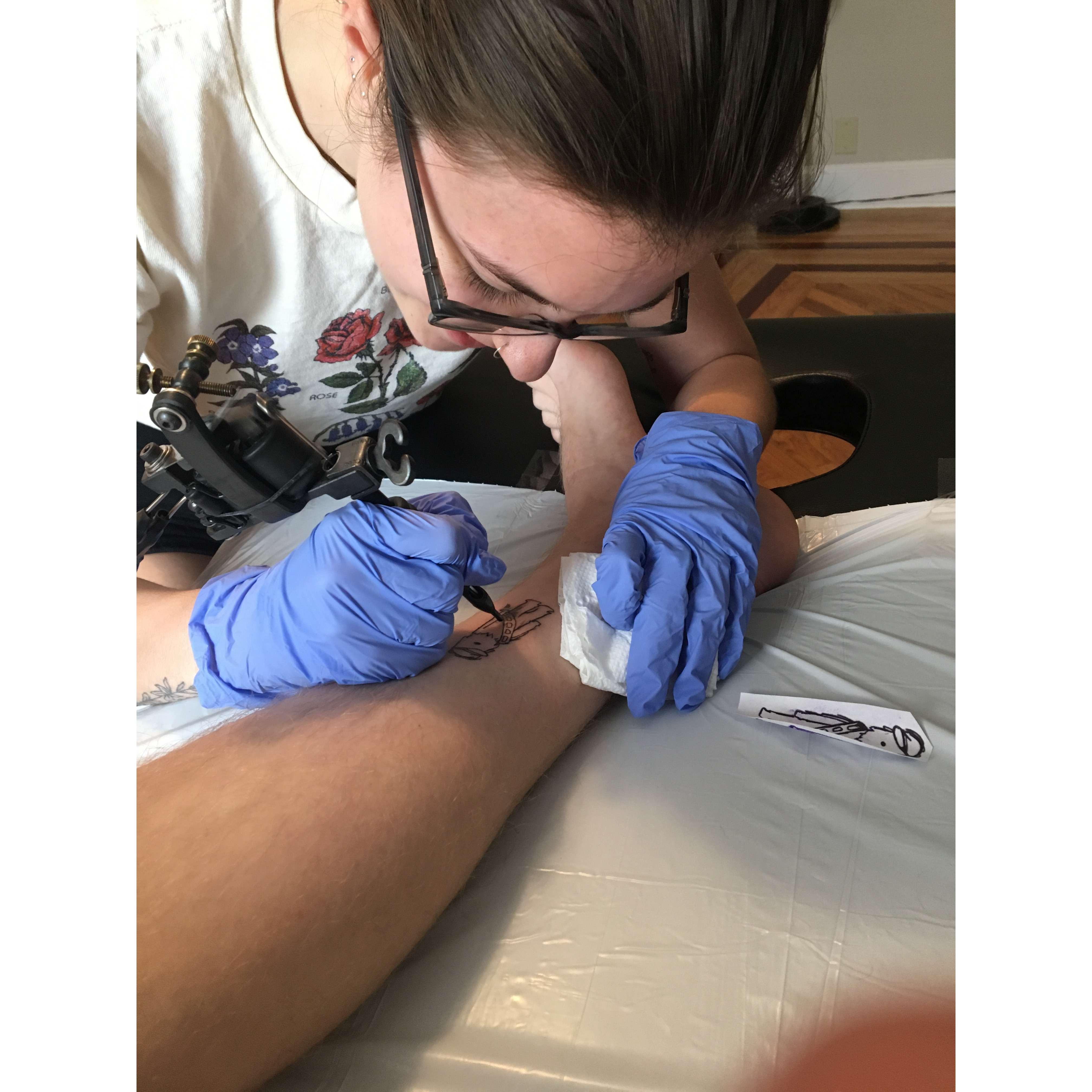 Jo giving Drew a Chewbacca tattoo that she designed when she came to visit Drew in GA before dating.