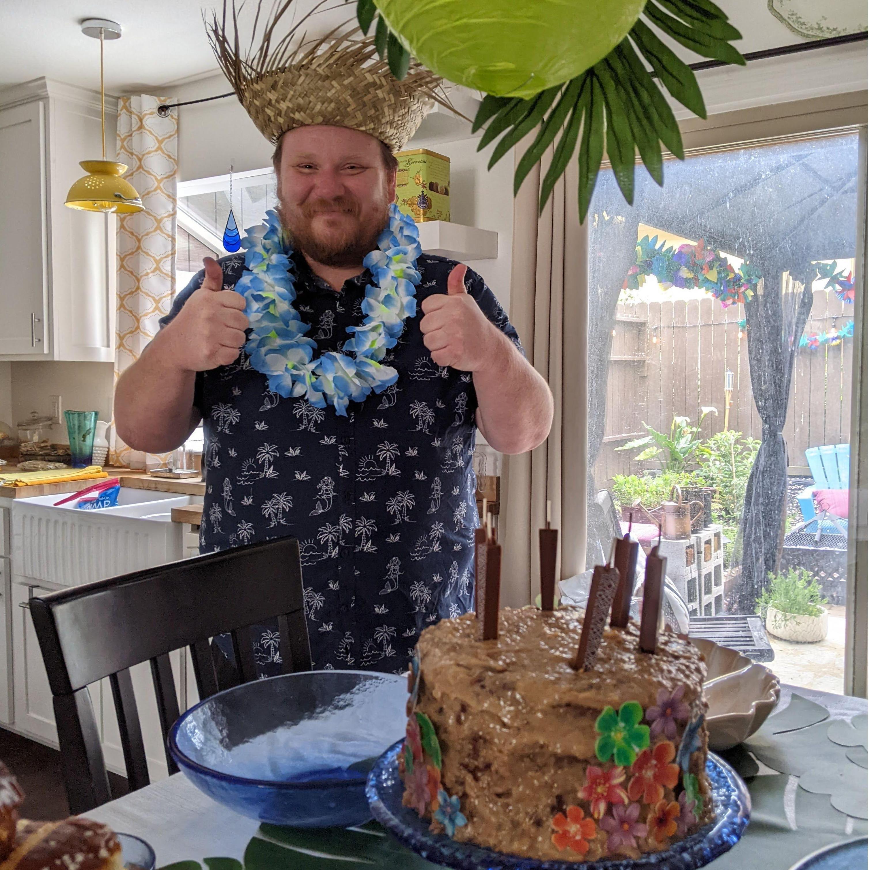 Alex's first birthday together with Sarah was a retro tiki theme, with his favorite cake, homemade German Chocolate with edible chocolate candels and rice paper flowers.