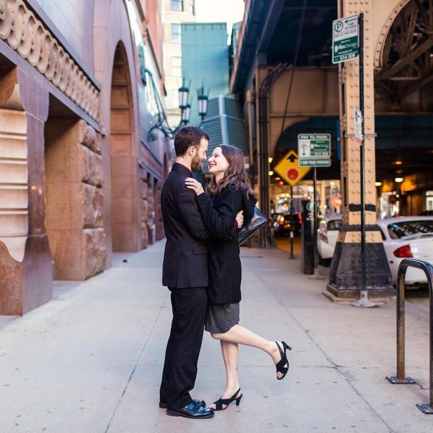 Engagement photos at the Harold Washington Library "L" Stop