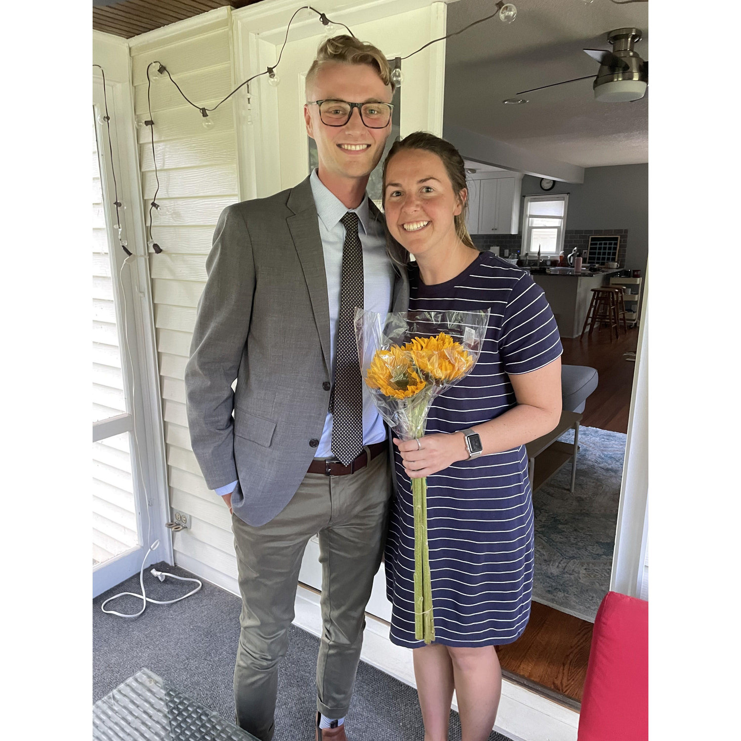 This was one of our first photos taken while dating. Matt, being the kindhearted romantic he is, showed up with a bouquet of sunflowers to celebrate the end of Hannah's school year. What a keeper!