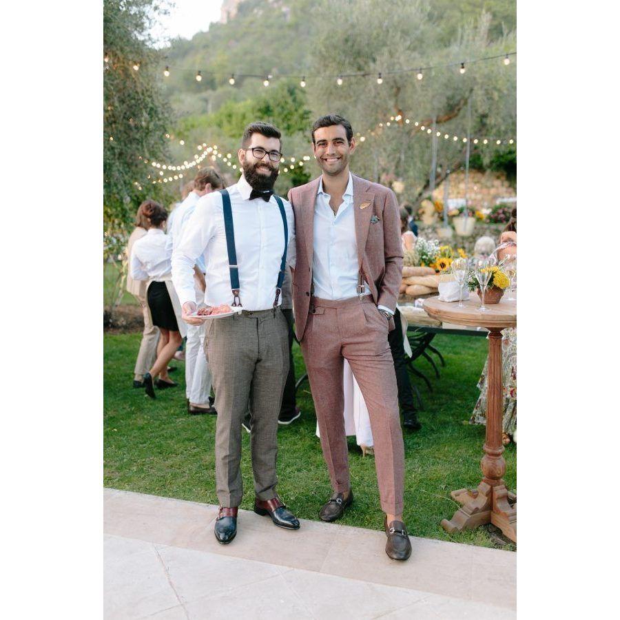 Men - any semi-formal wear is appropriate. Matching suit or sports coat and khaki's is great. No ties necessary but welcome if you want to wear one!