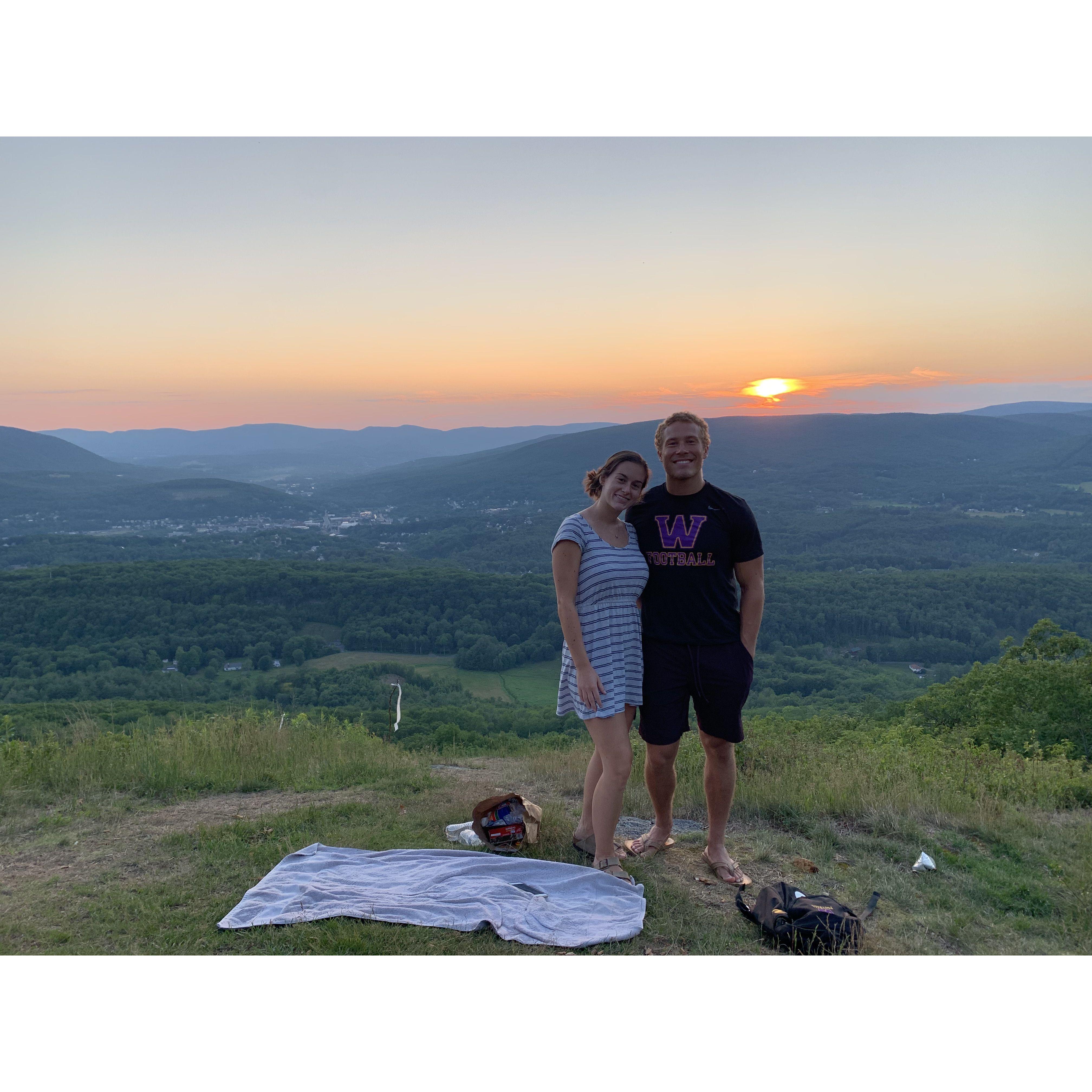 Kyle surprised Allison by planning a picnic for the Fourth of July in Williamstown. They built a fire and watched the fireworks!