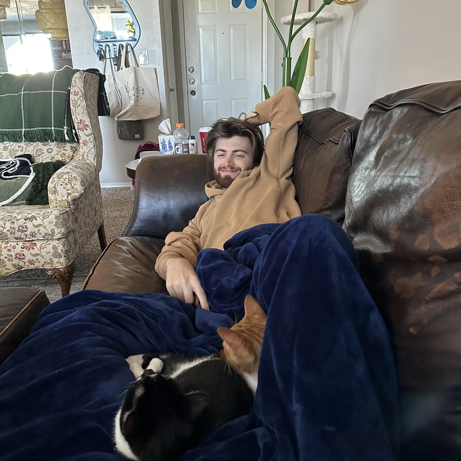 Jack embracing his new role of “Cat Dad”! He loves our boys, Winston and Curtis! January 2025