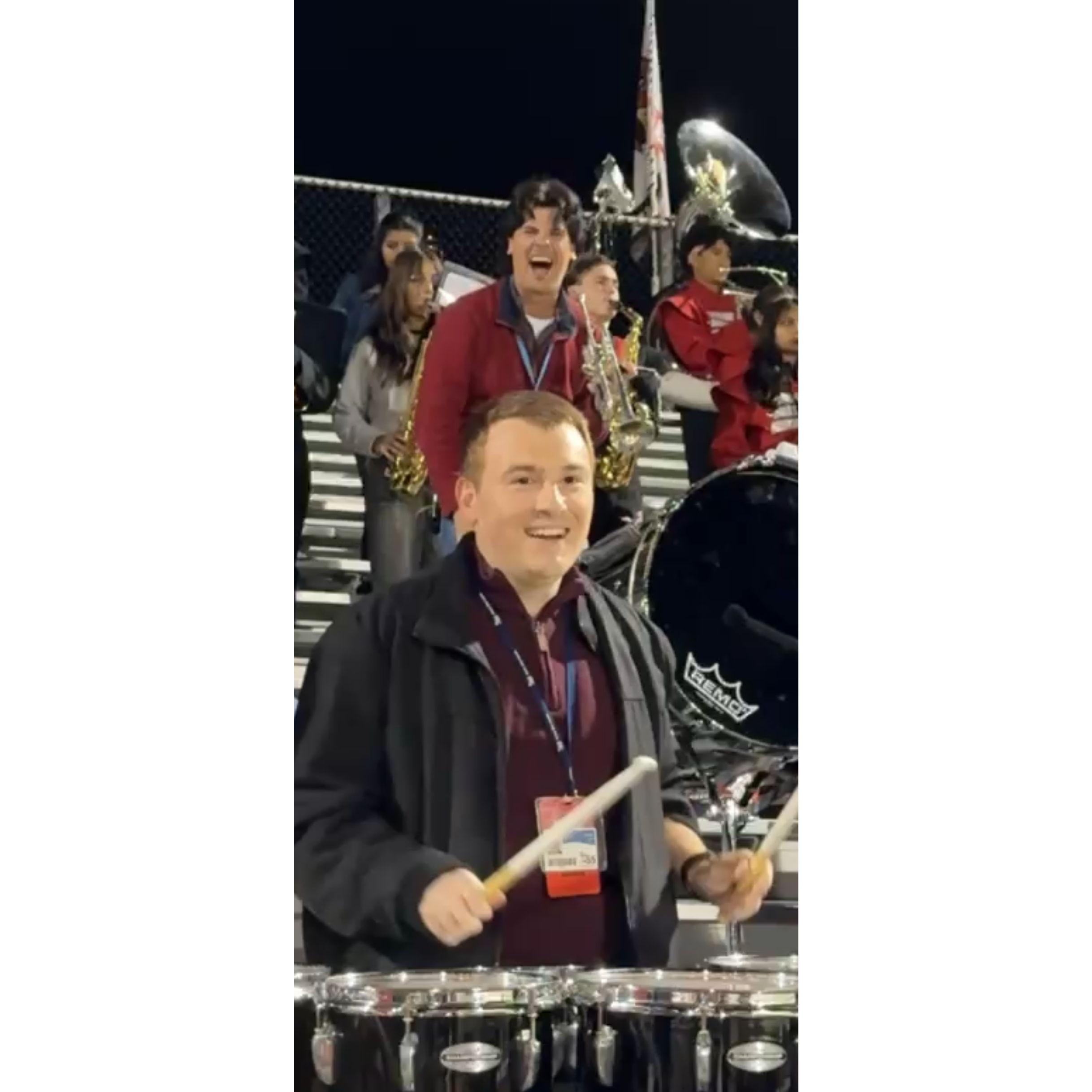 Marching band staff filling in some extra parts!