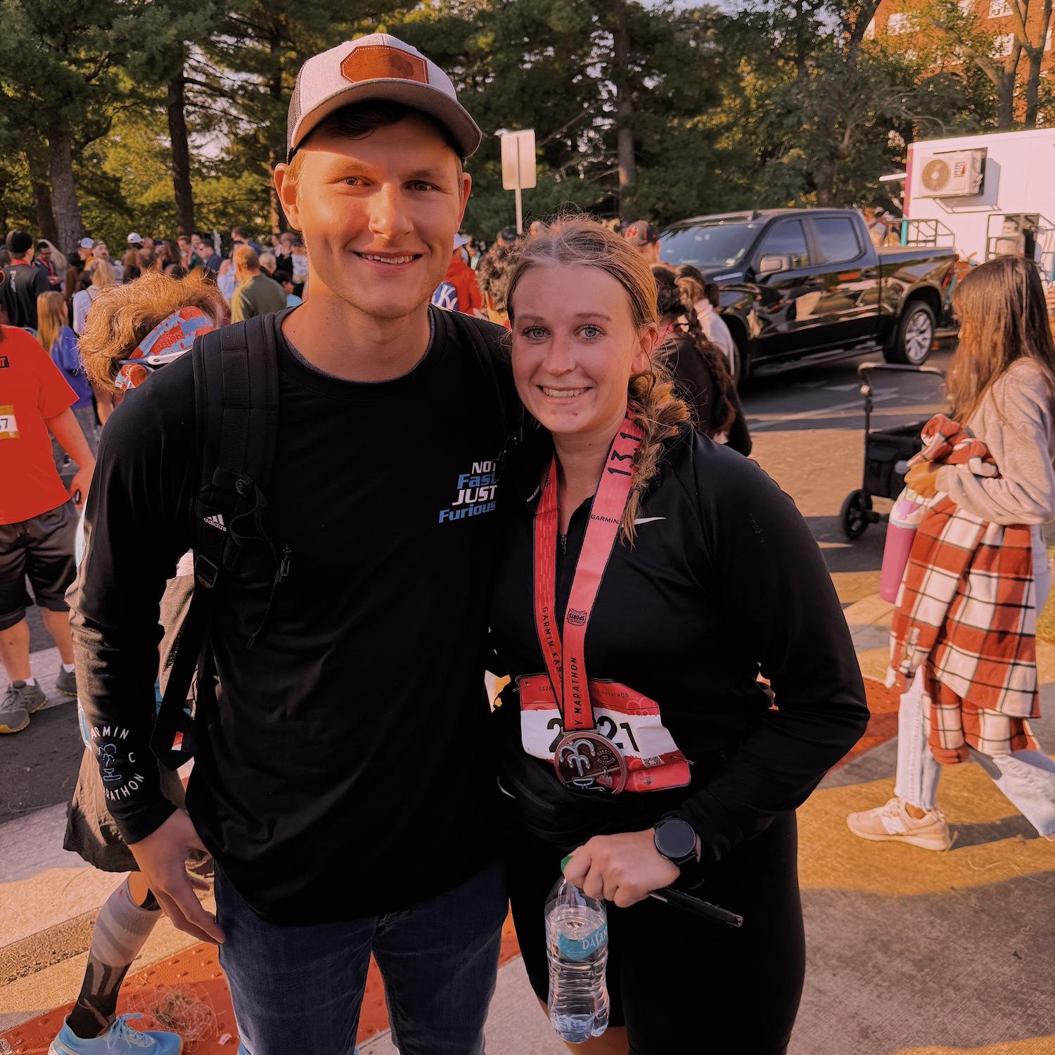Brandon cheering me on for my 1/2 marathon