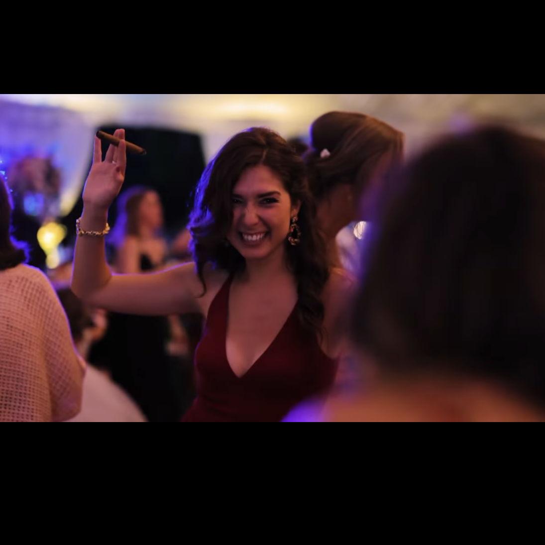 The girl in the red dress at the very wedding Mark and Lauren met at.