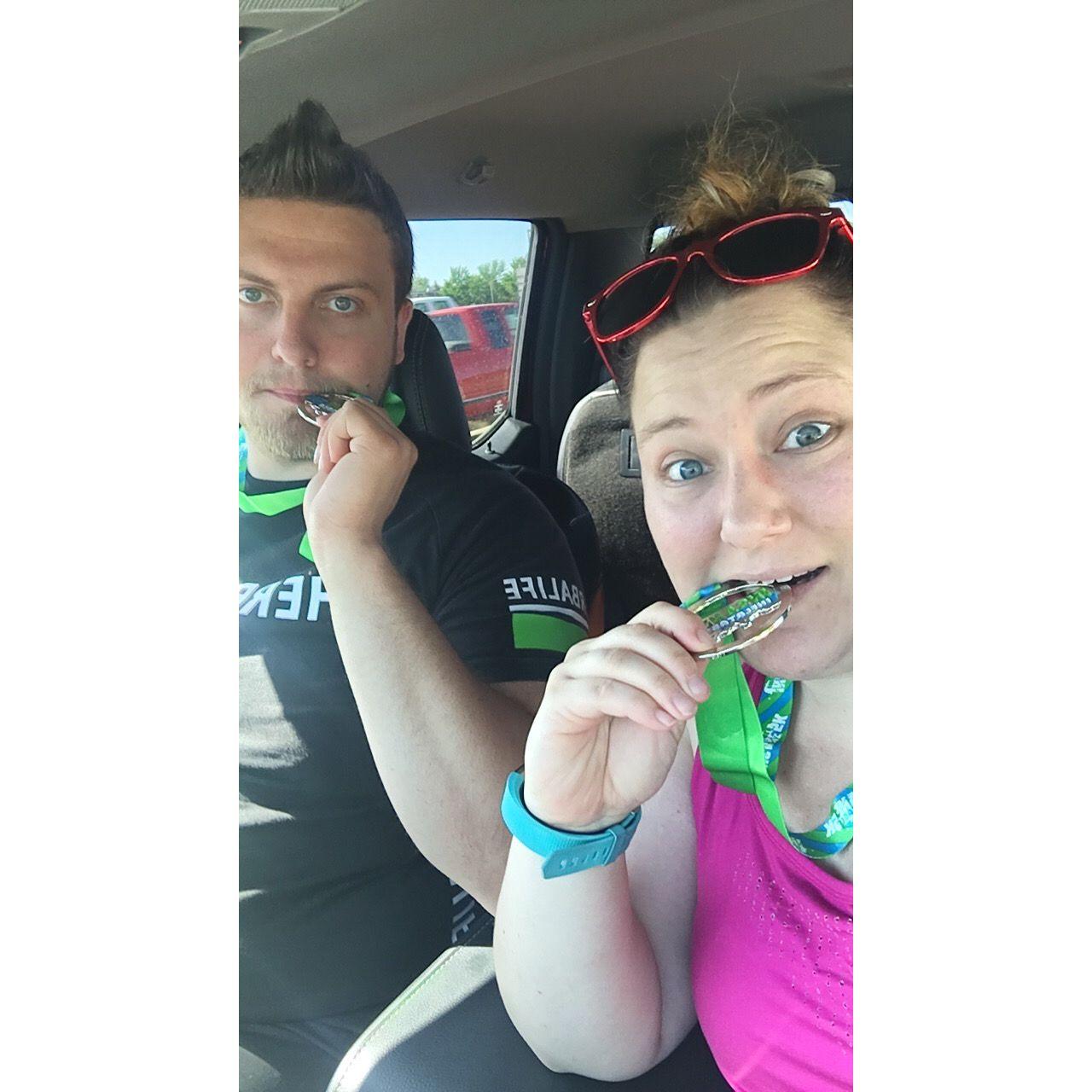 Ran the Insane Inflatable 5K and we got our metals! Had to make sure they were real.