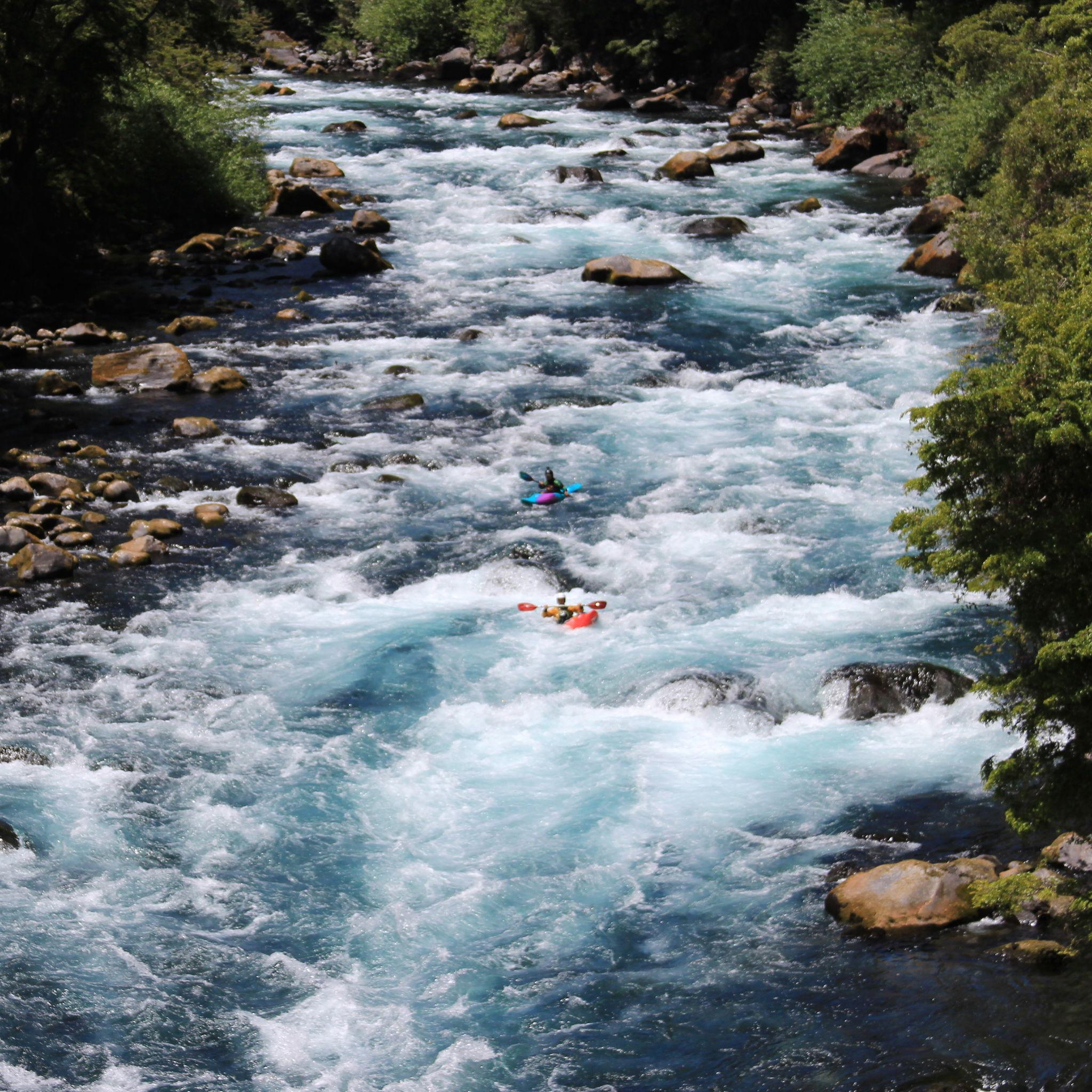 Chasing each other down the Rio Fuy in Chile, photo captured by Mel