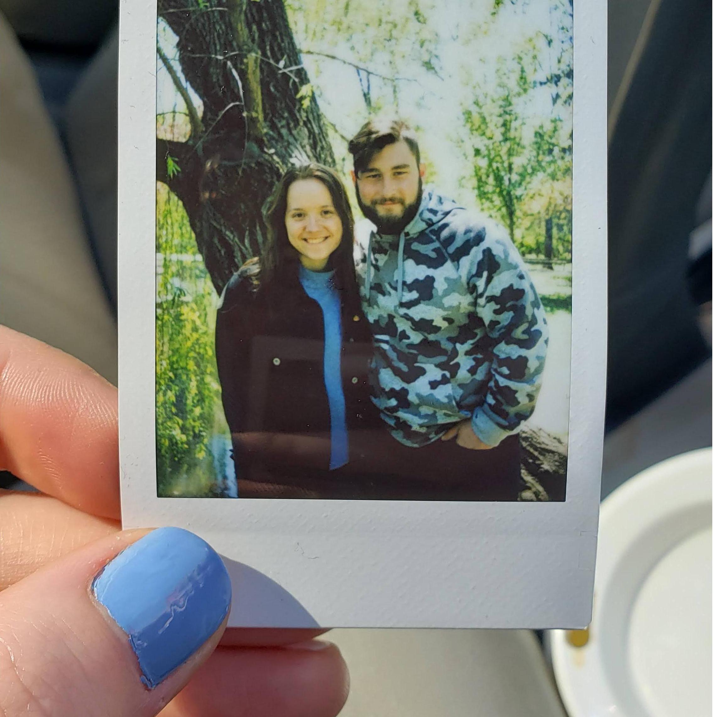 a week before graduation and our friend snapped a polaroid of us while at a park - our first polaroid together