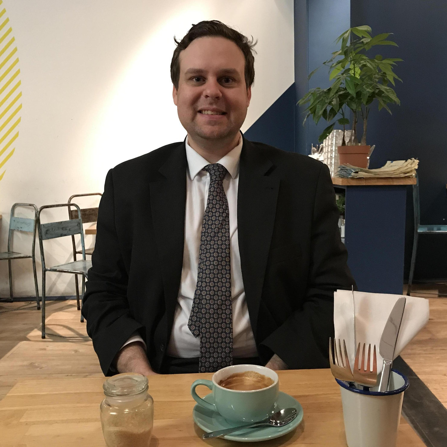 Snapped at a cafe during Eliza's visit to Brussels that year Jason worked at a law firm there.