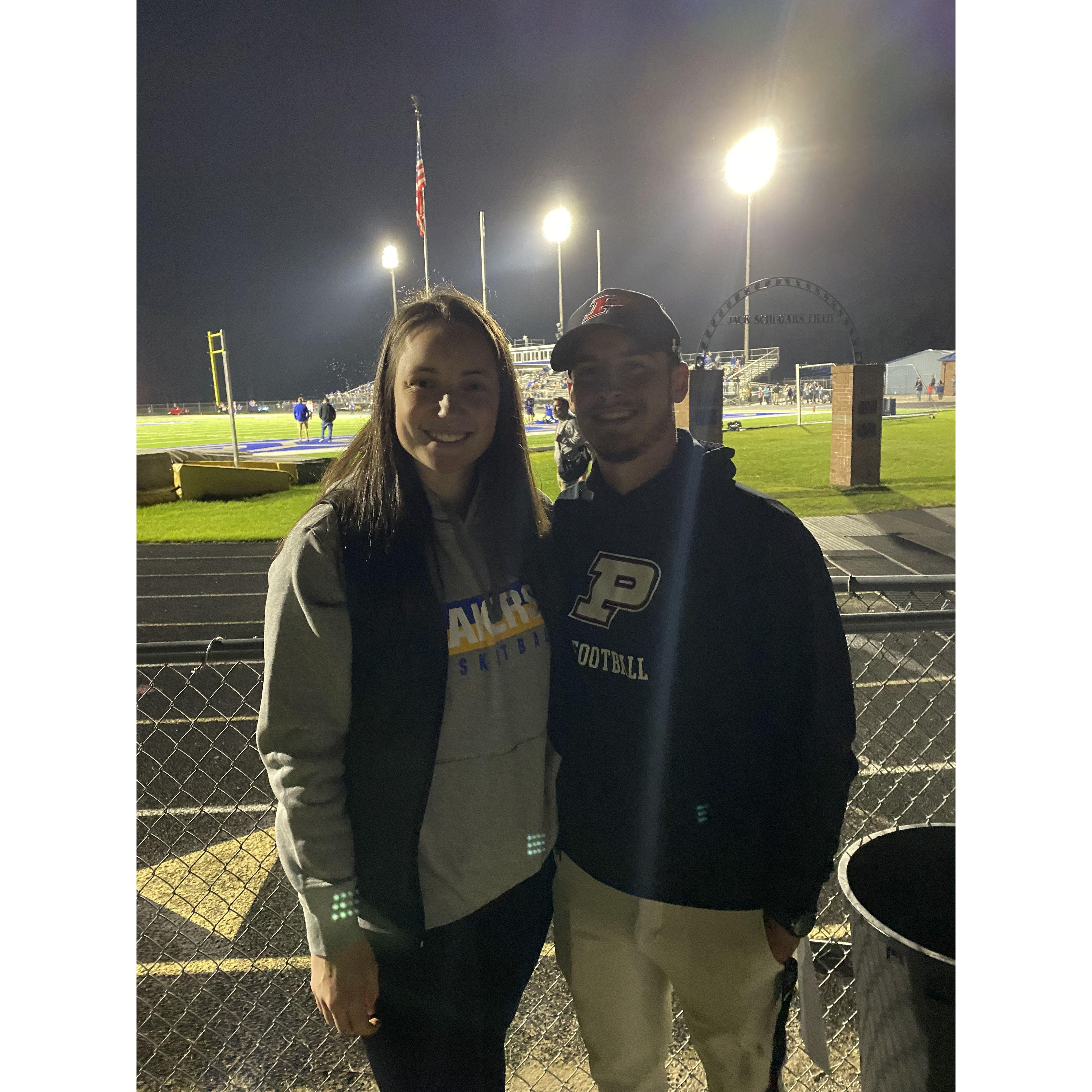 Kelly drove home to watch Scott coach football.