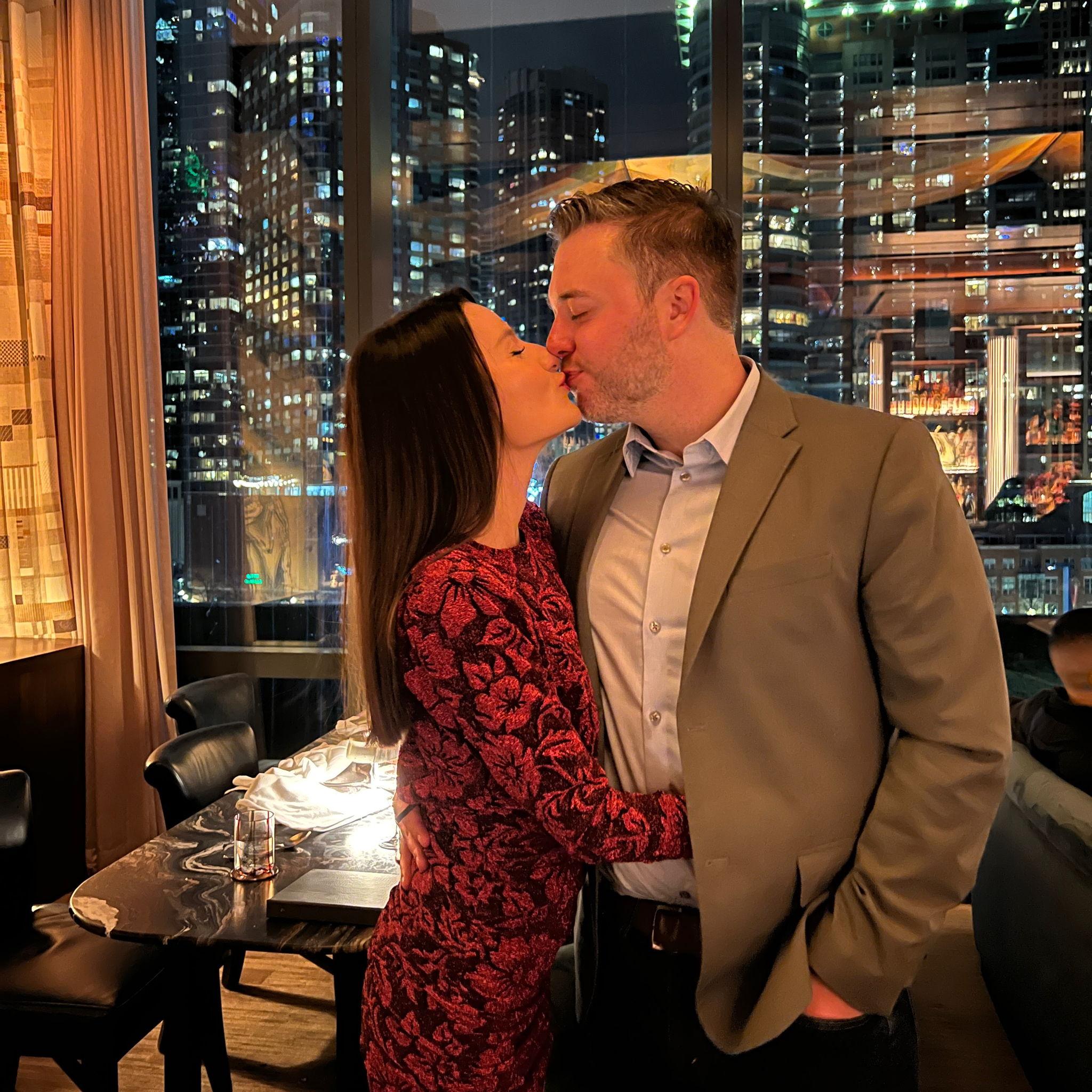 Practicing our wedding kisses at Tre Dita, our reception venue.