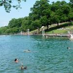 Bring your swimsuit and take a dip in Barton Springs, a natural, spring fed limestone pool