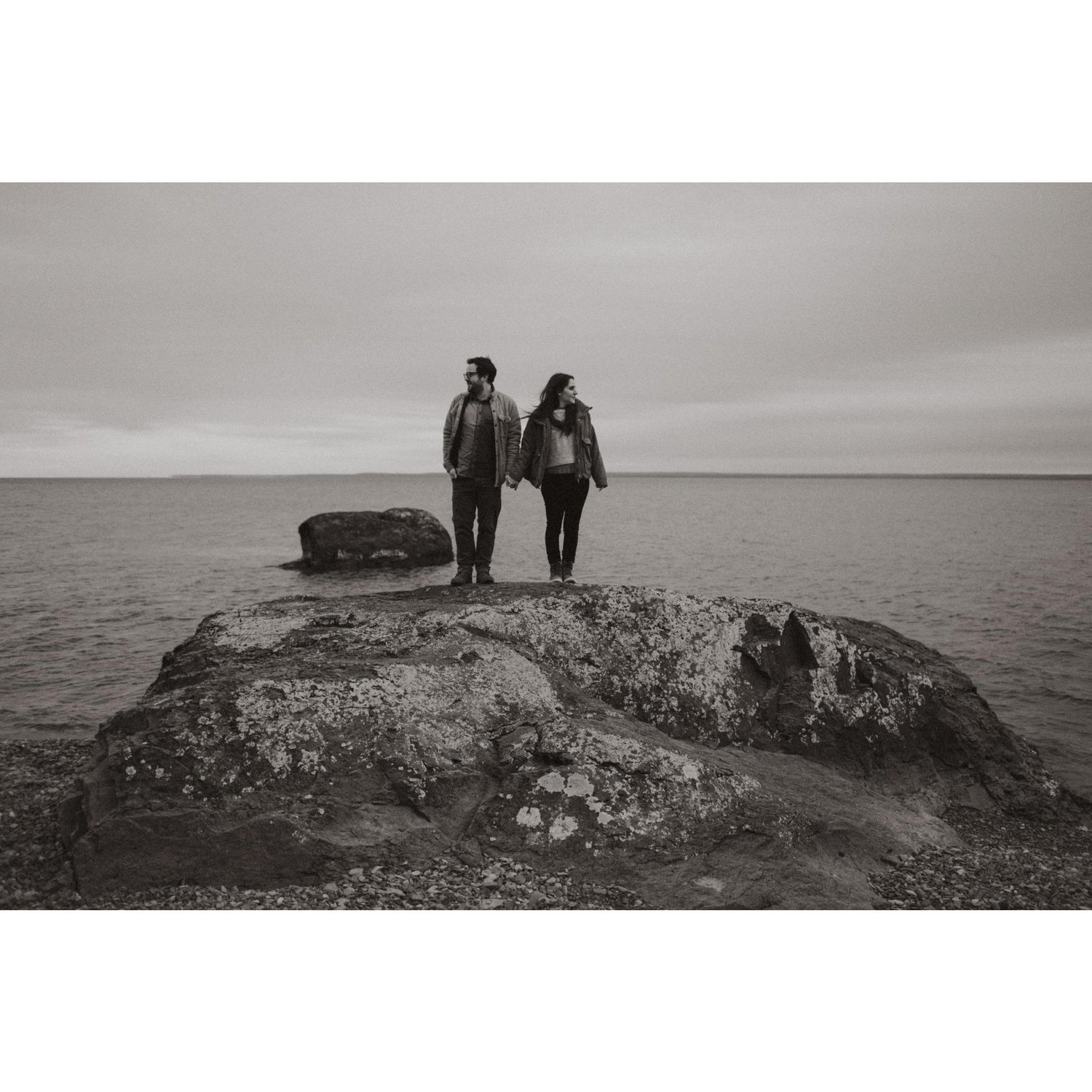 Engagement photo on a rock by Lake Superior. Couldn't stay on it for long. Wind made it feel like 0 degrees.