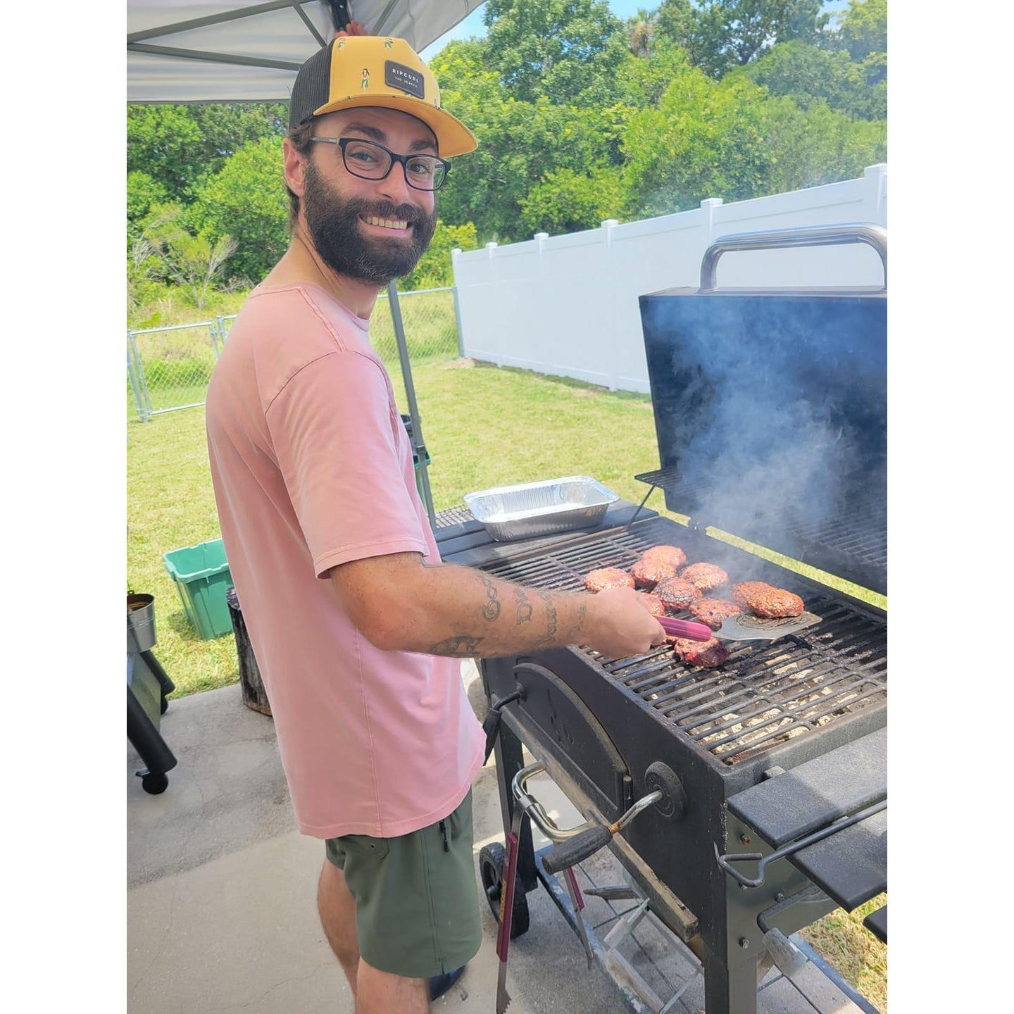 The grill master at work in his natural habitat.