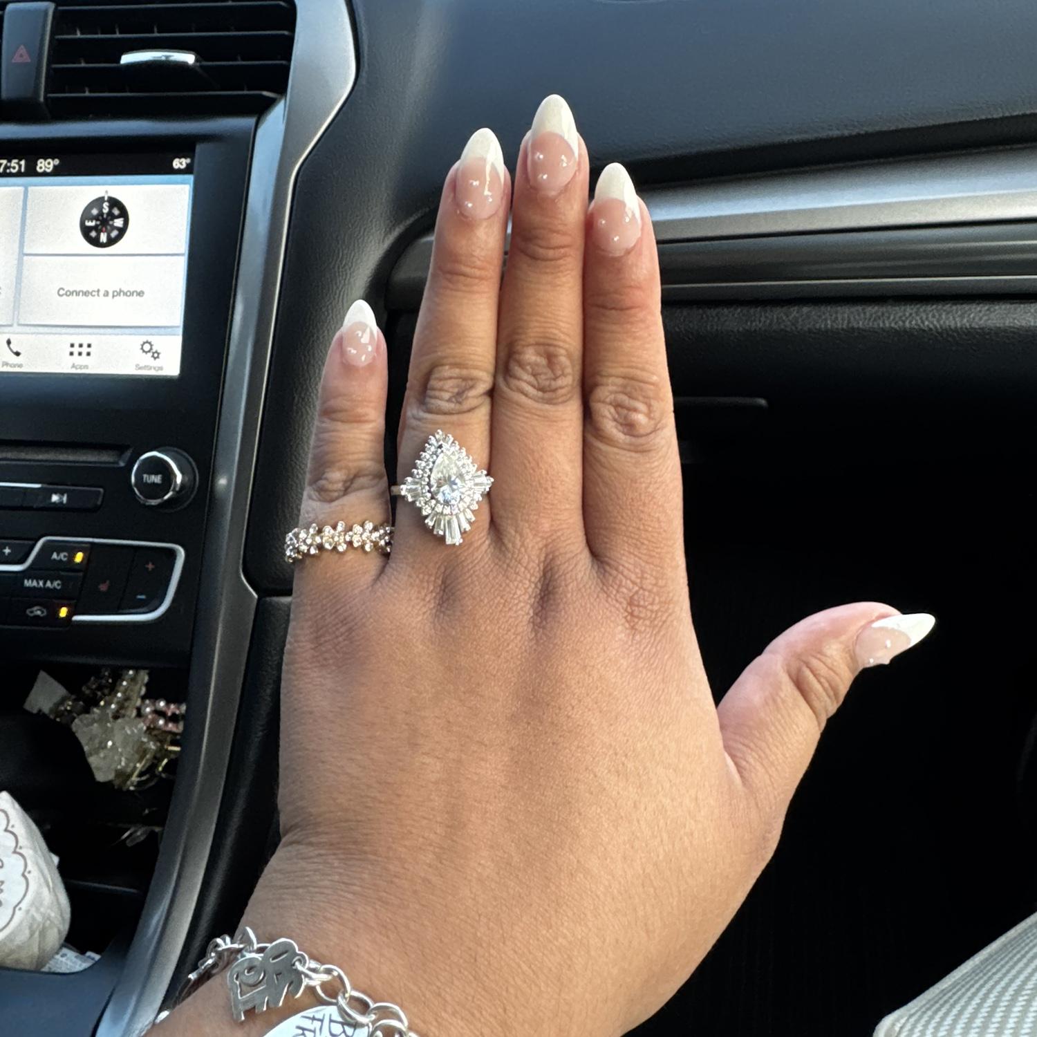 A moment for the ring, but with pretty nails ;)