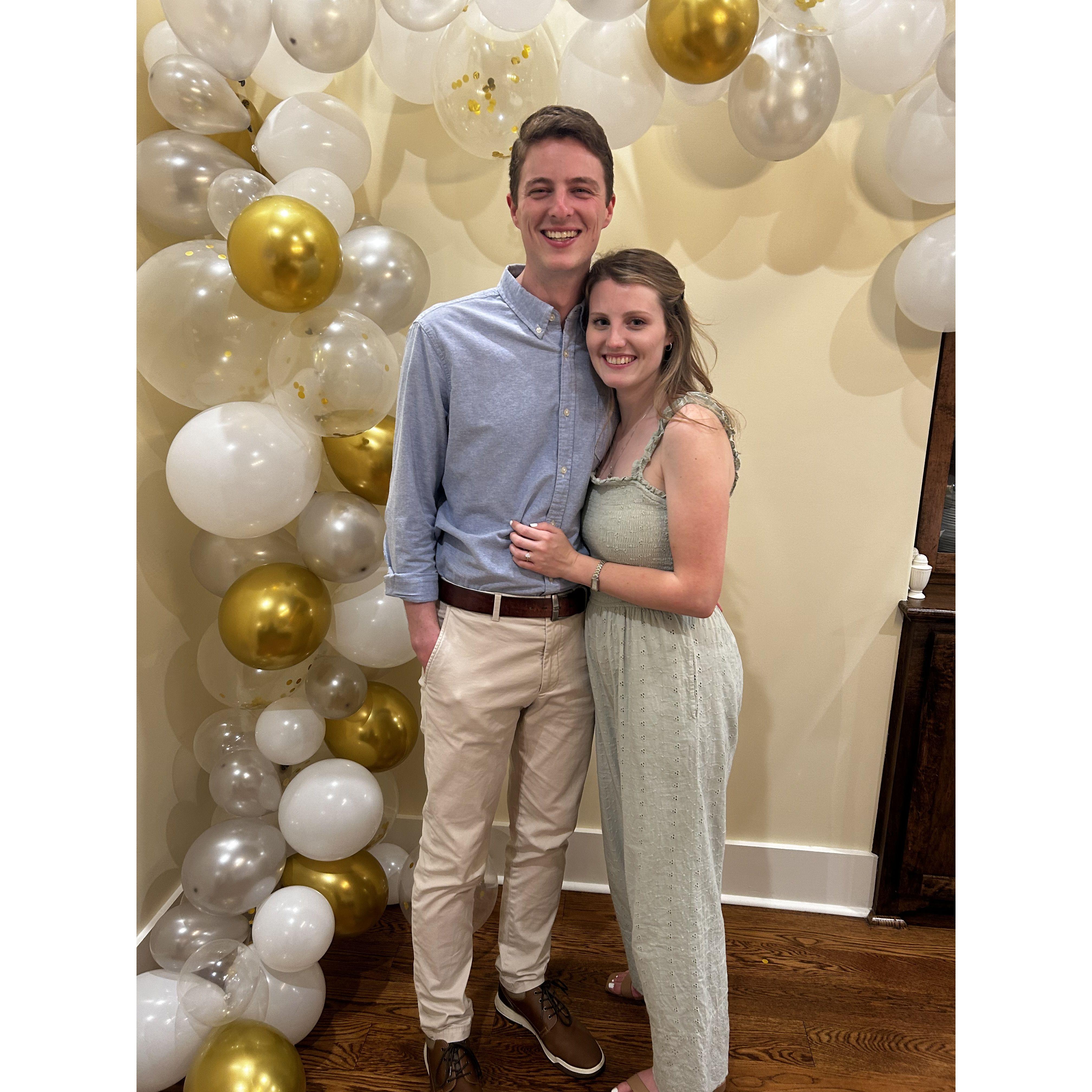 A pic from our engagement party! We're grinning so hard because we have the sweetest friends and family.
