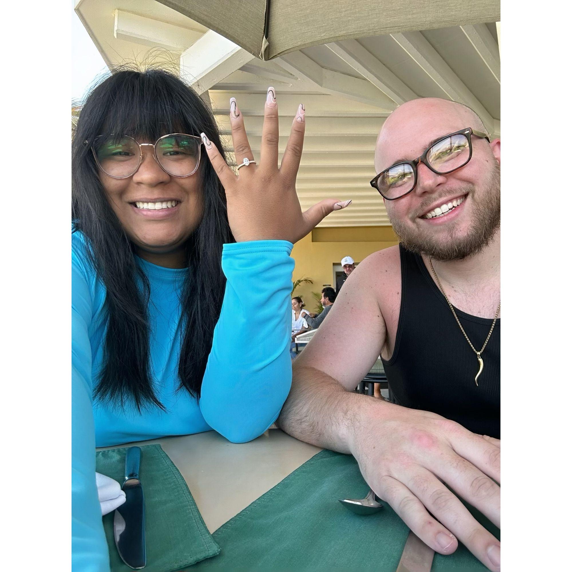 Showing off the engagement ring for our family.