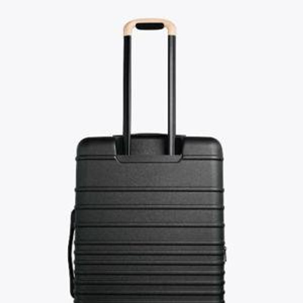 The Beis Medium Check-In Roller in Black