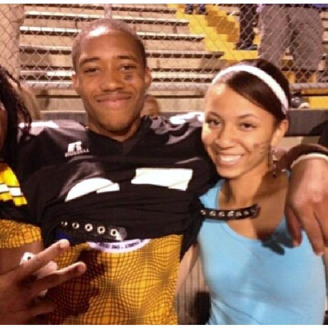 2013: Cheering #37 on senior year of high school.