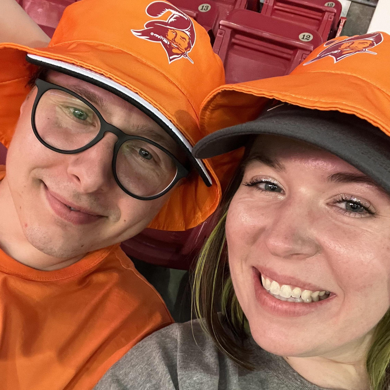 Our first bucs game together! Alex's car broke down in the middle of the intersection a mile from the stadium and we had to push it. We did get free bucket hats tho!