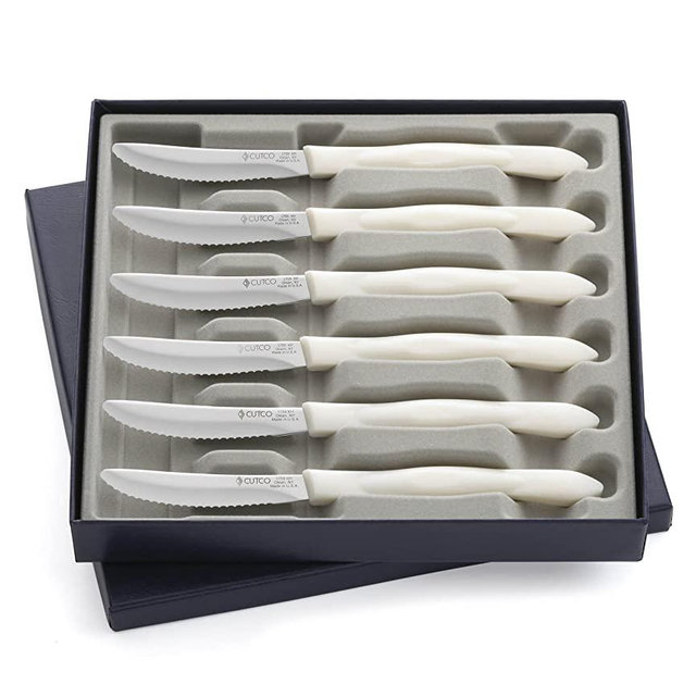 CUTCO #1869 set of 6 White (Pearl) Model 1759 Table Knives, each in a factory-sealed plastic bag inside attractive blue CUTCO gift box..............3.8" Double-D serrated 440A High-Carbon, Stainless Steel blades and 5" handle.