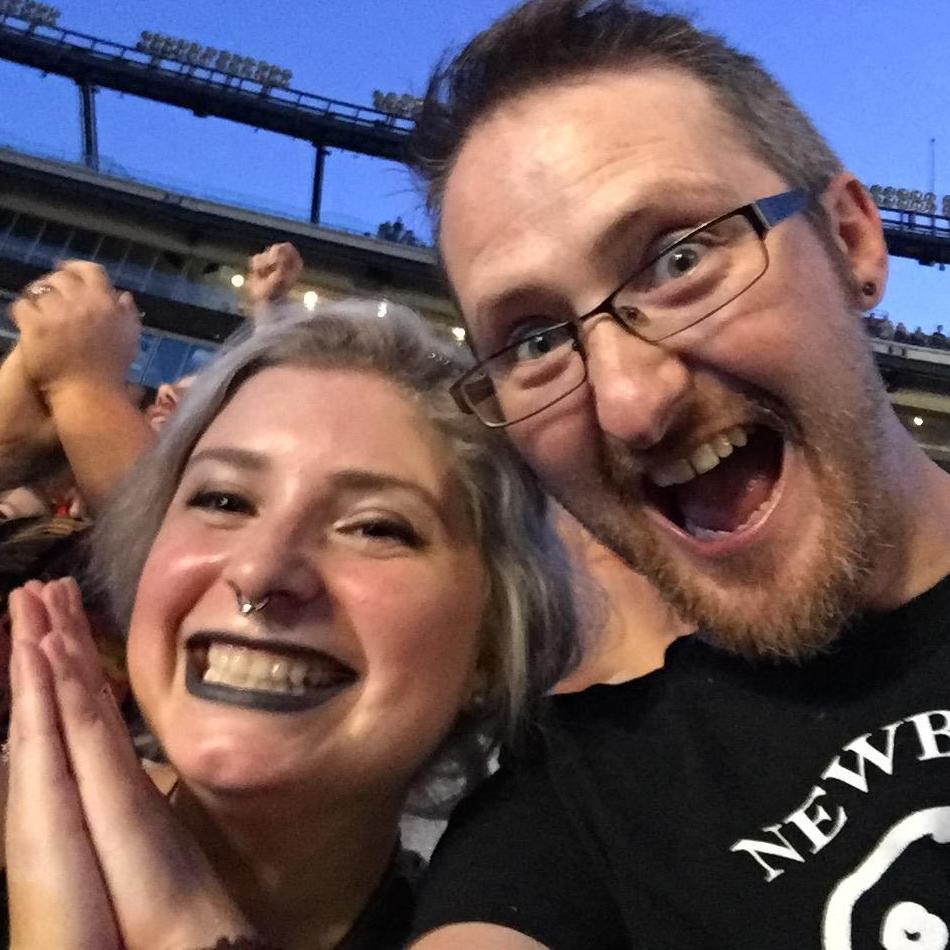 Our faces after being upgraded to floor level seats at the Guns 'N Roses concert.