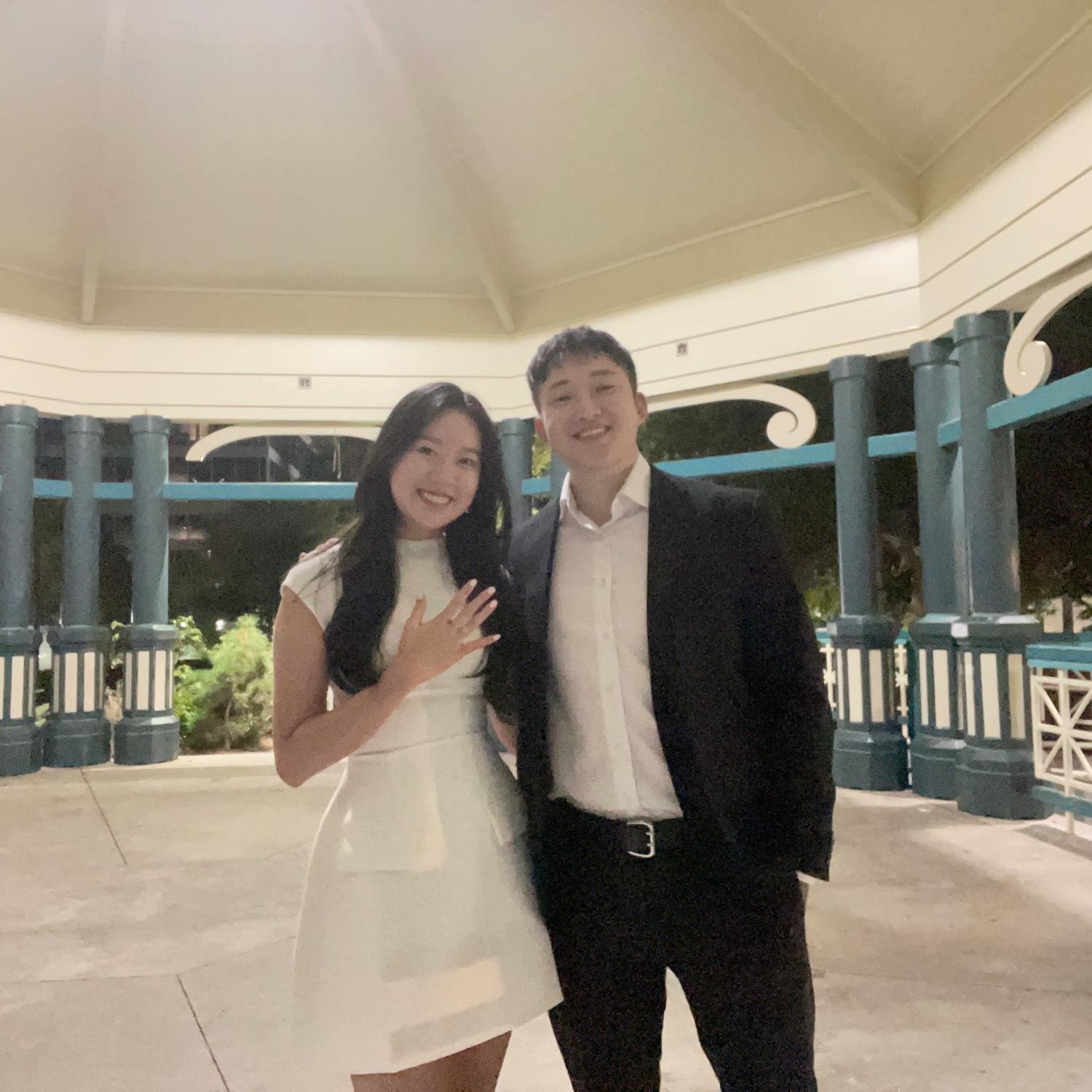 We got engaged in front of the podium of Downtown Decatur. Backstory, 4 years ago I jumped off this stage because I was nervous Joseph would try to kiss me and it became our inside joke!