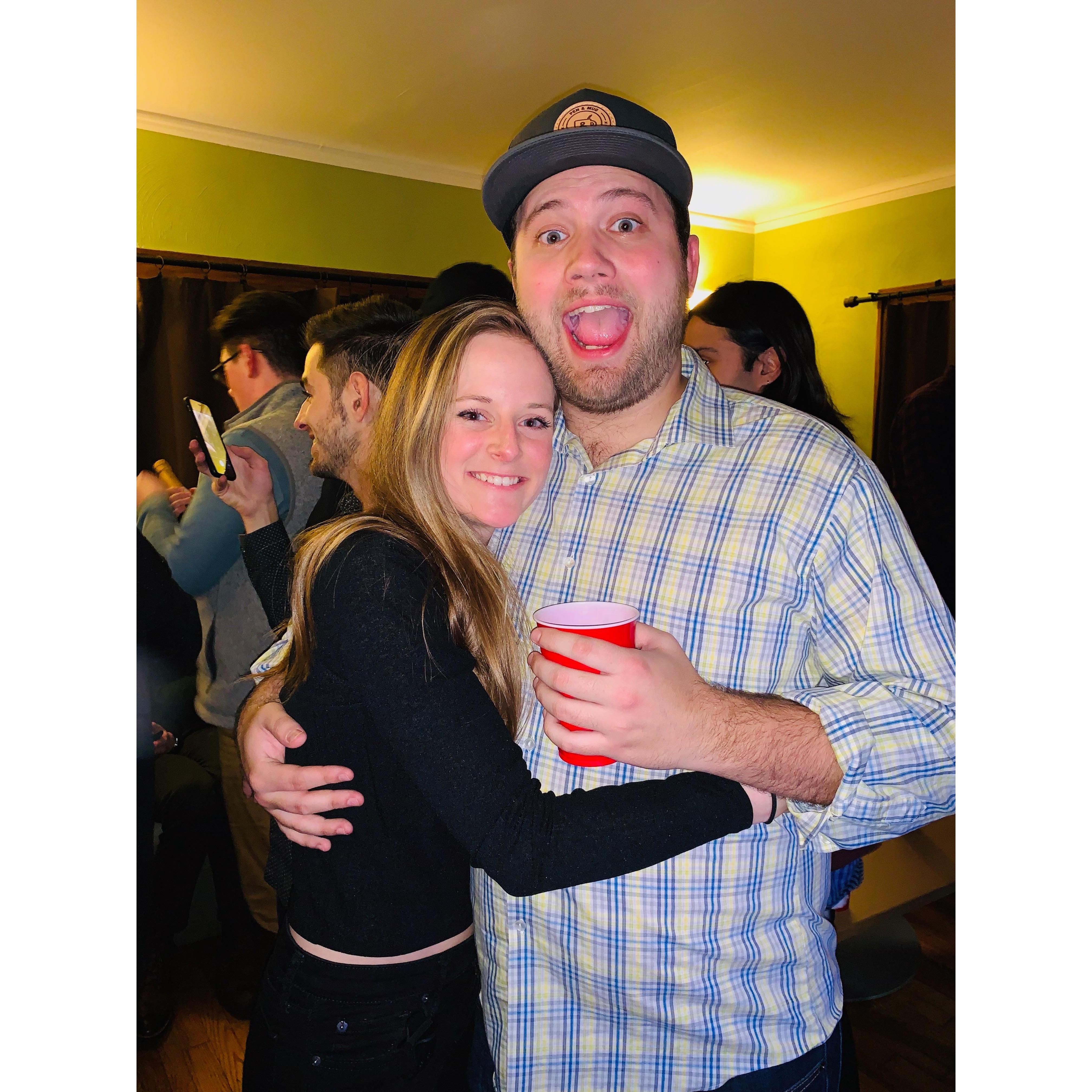 Max in a patterned party shirt. Lyn wearing all black. Typical.