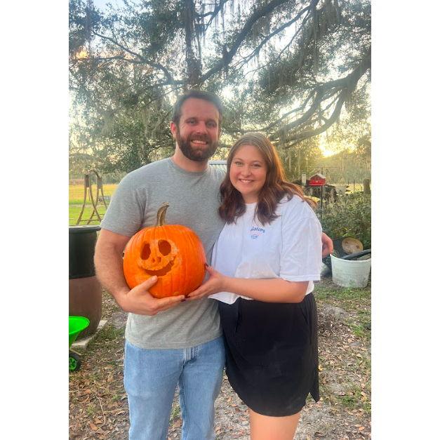 Carved our first pumpkin together and Adam's first too!