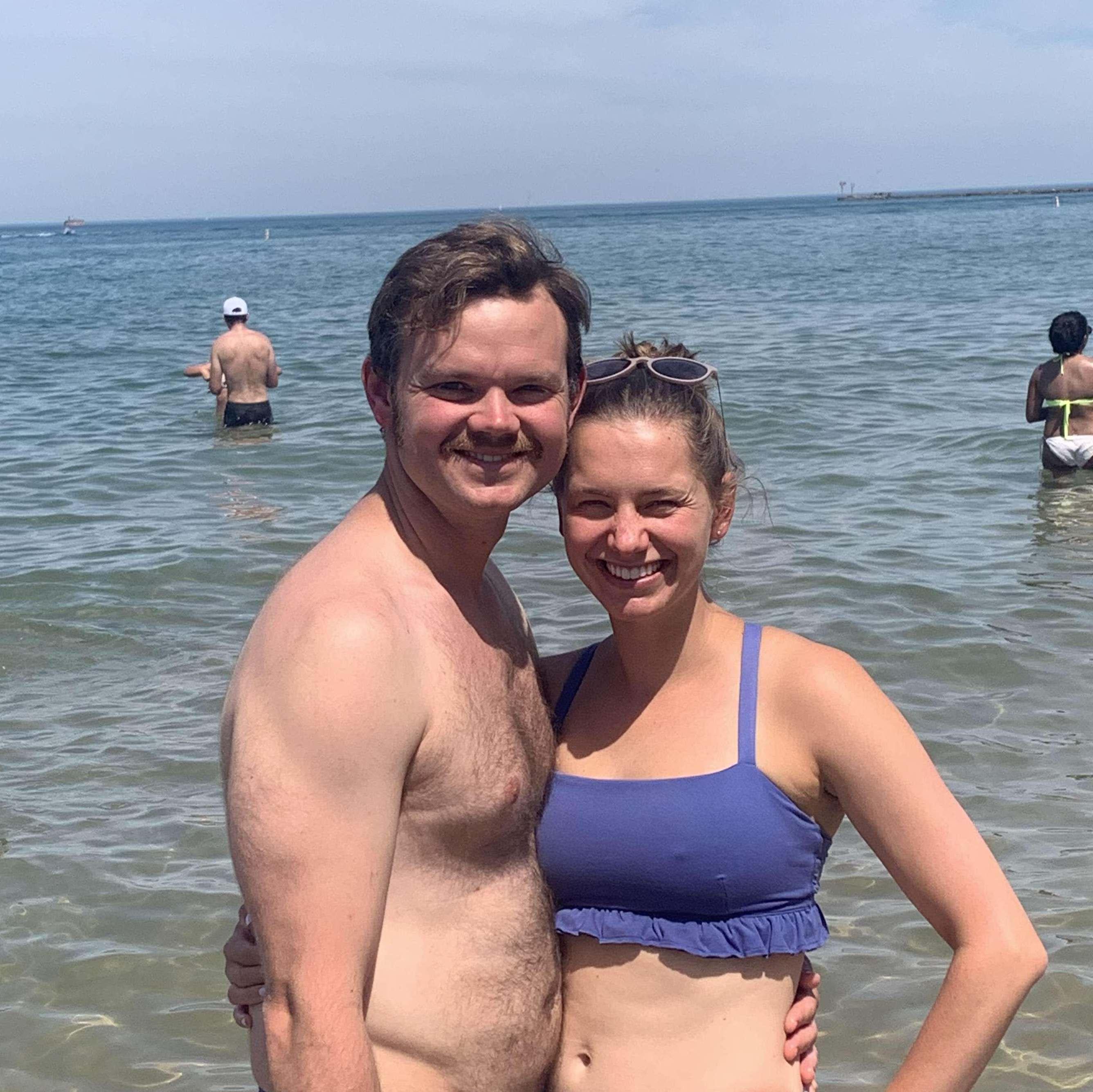 Erin convincing Joe that the shore of Lake Michigan counts as a beach