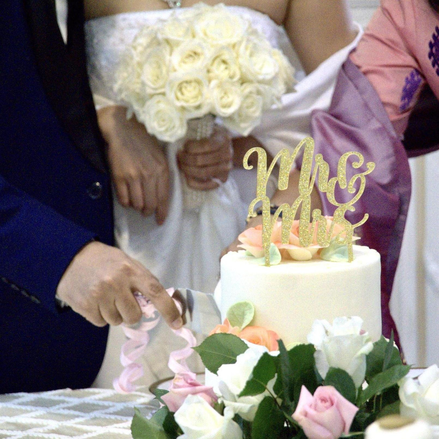 Cutting our wedding cake