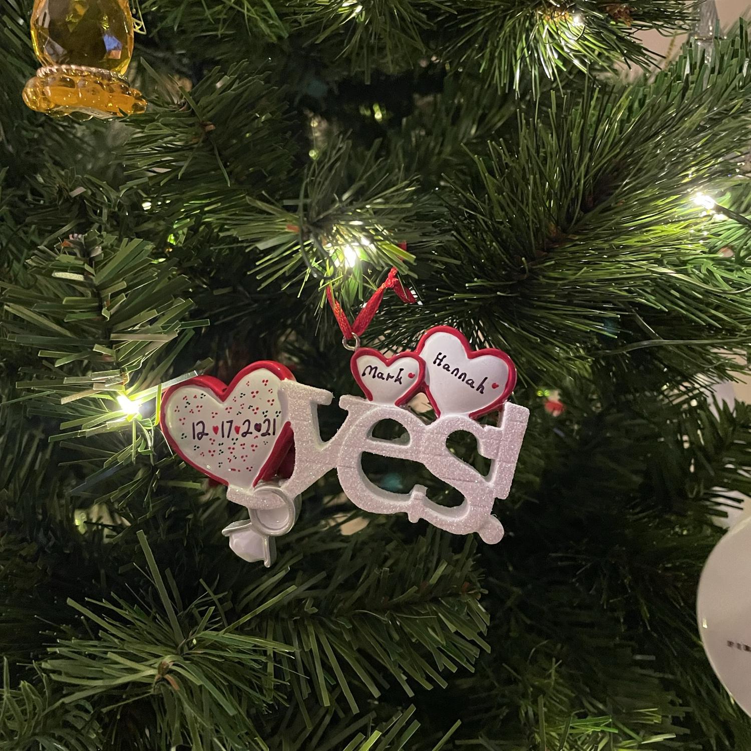 The ornament he actually proposed with!❤️💚