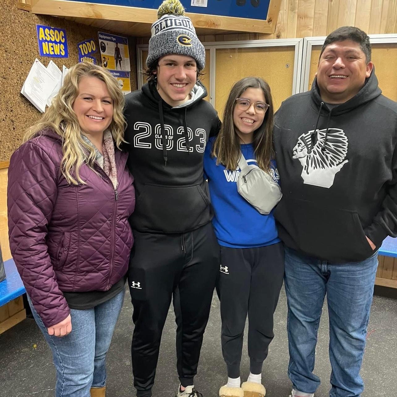 Both families coming together to share the joy of hockey.