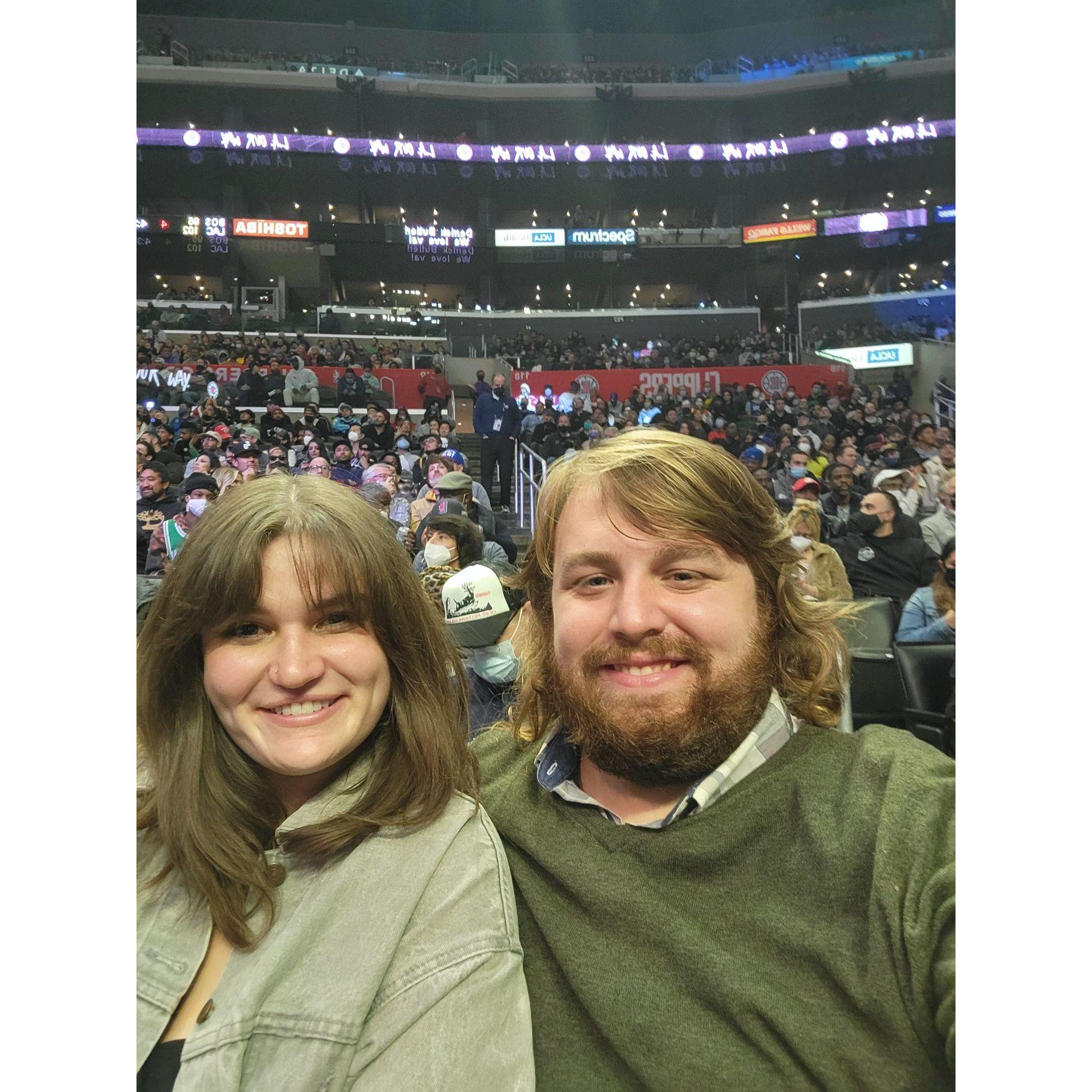 first pic together, courtside at the Clippers vs Celtics game