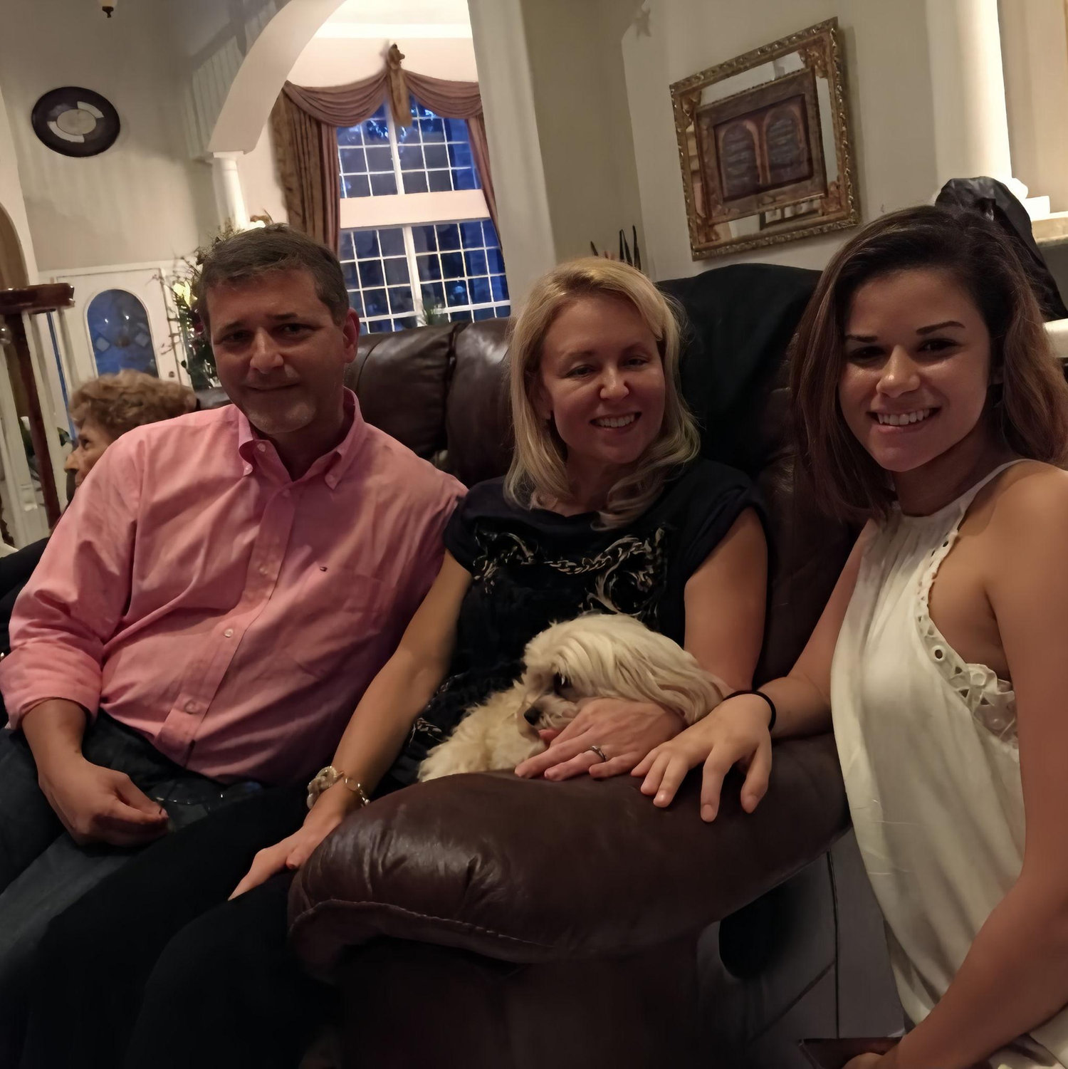 In this picture, Nathalie is with her padrino  Dr. Torres-Gluck and his wife Arletta.