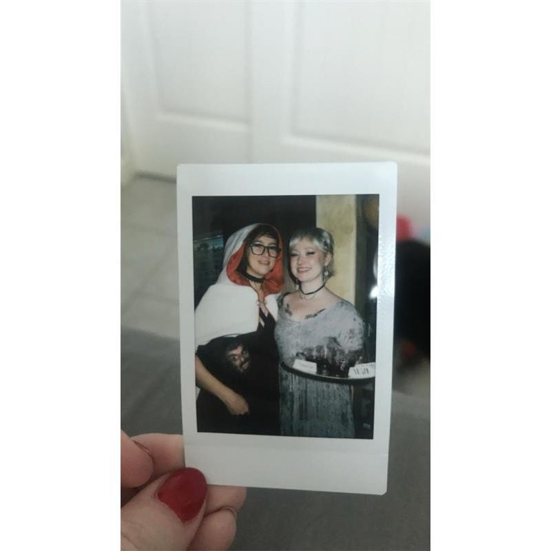 Our first photo together, Halloween 2021. Sydney carries this photo in her wallet.