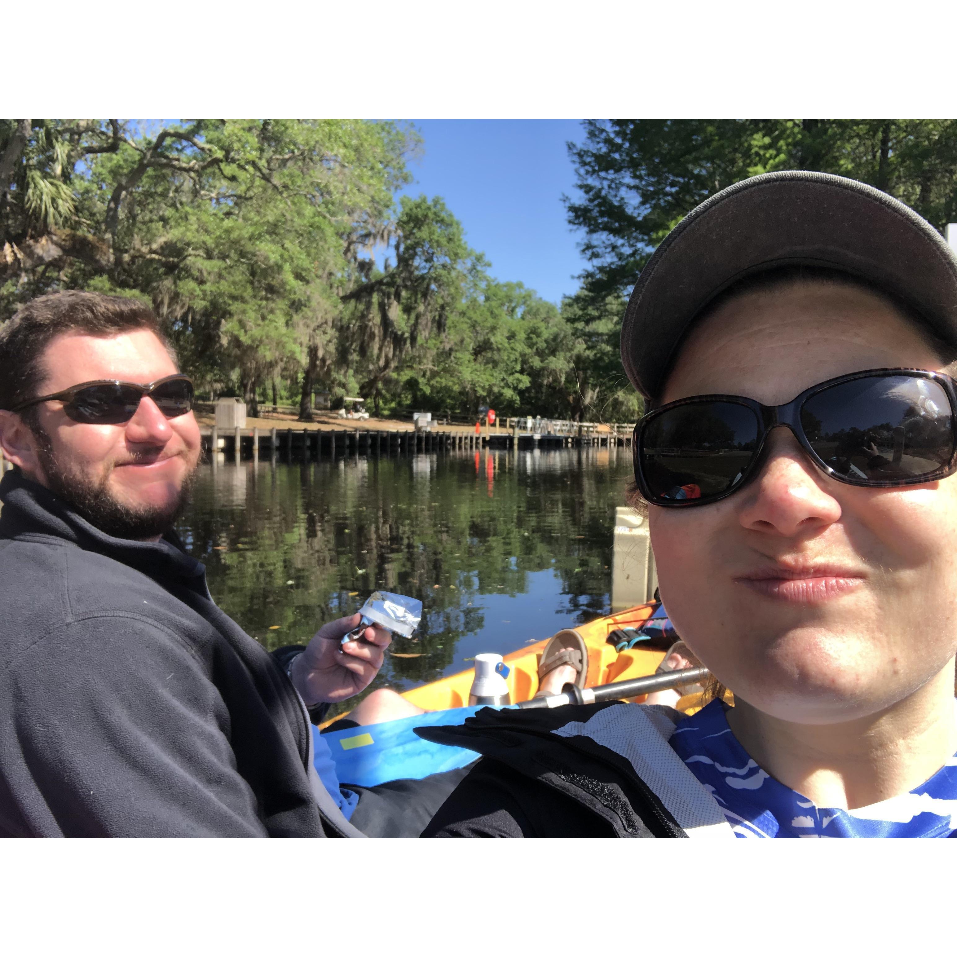 Munchen on some snacks while Kayaking