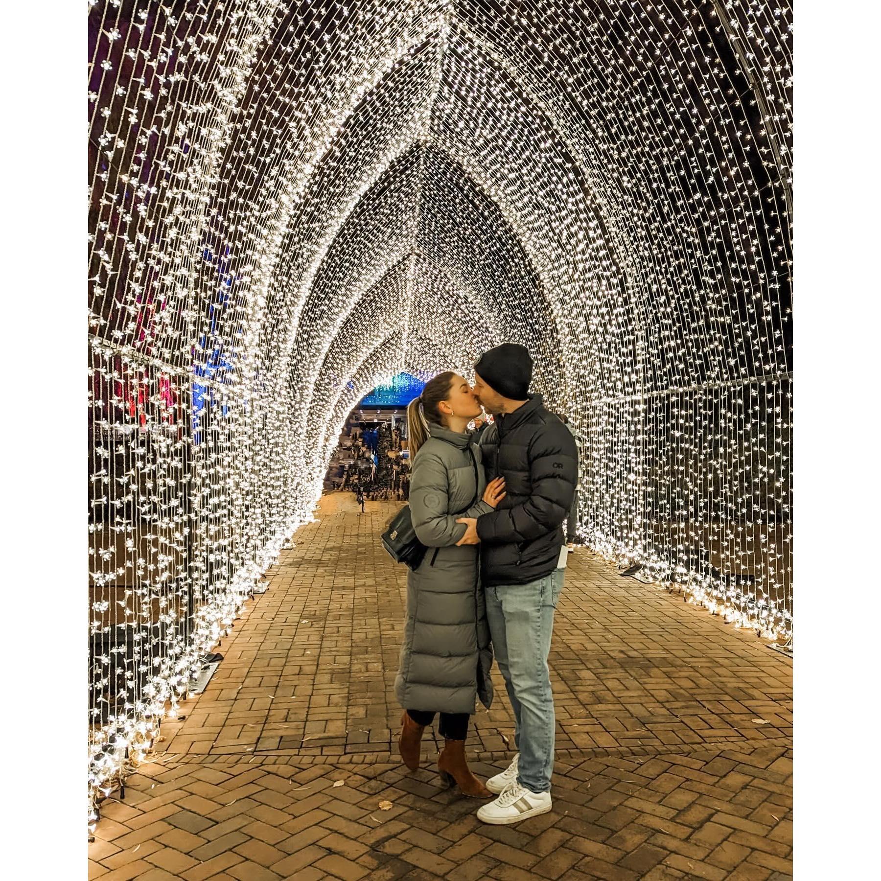 Sneaking a kiss at the Botanical Gardens in Chicagoland, 2023