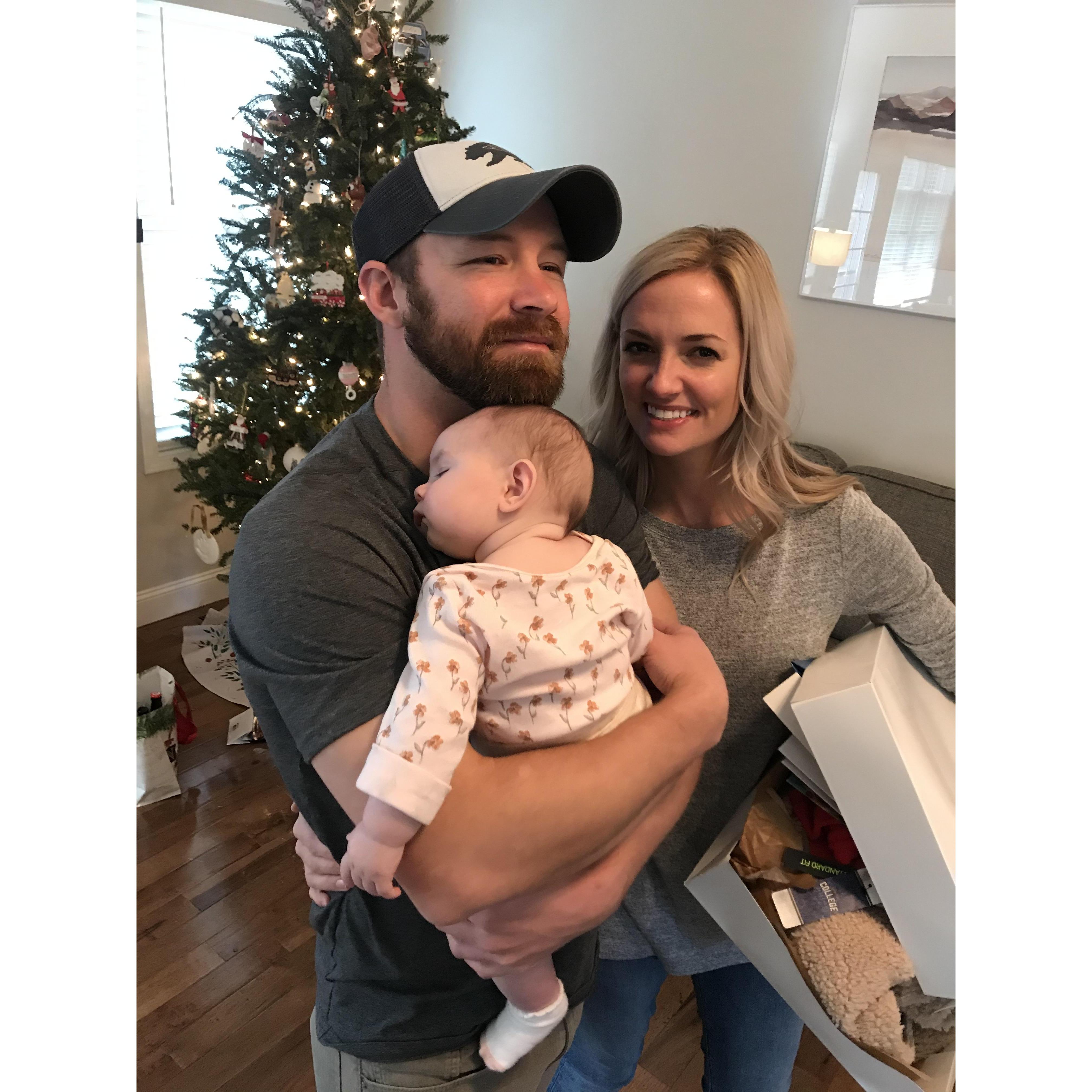 Celebrating Christmas while soaking up love from baby Addie. JR and Lauren Nealy's youngest daughter.