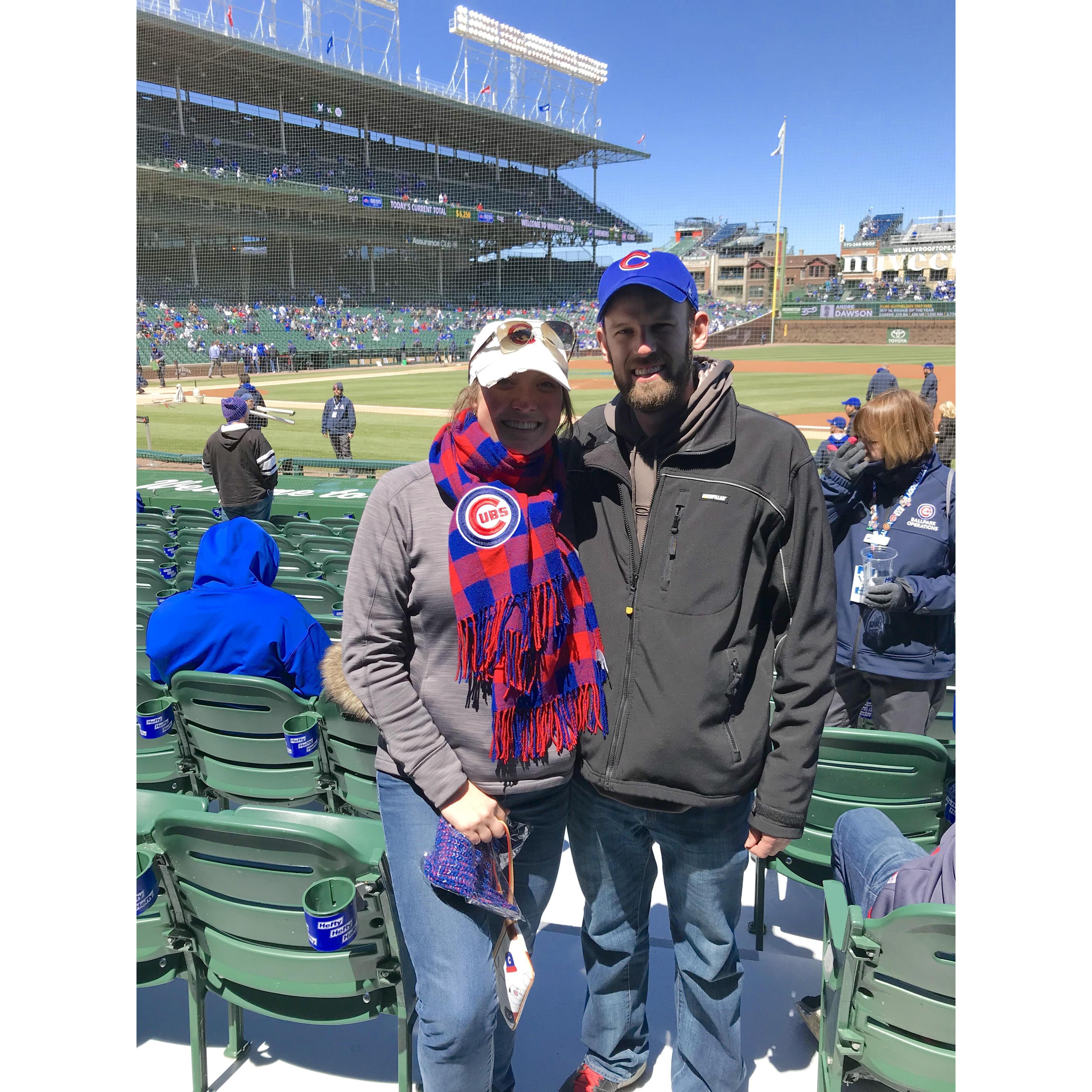 Courtney is continually teaching Kevin how to be a solid Cubs fan.