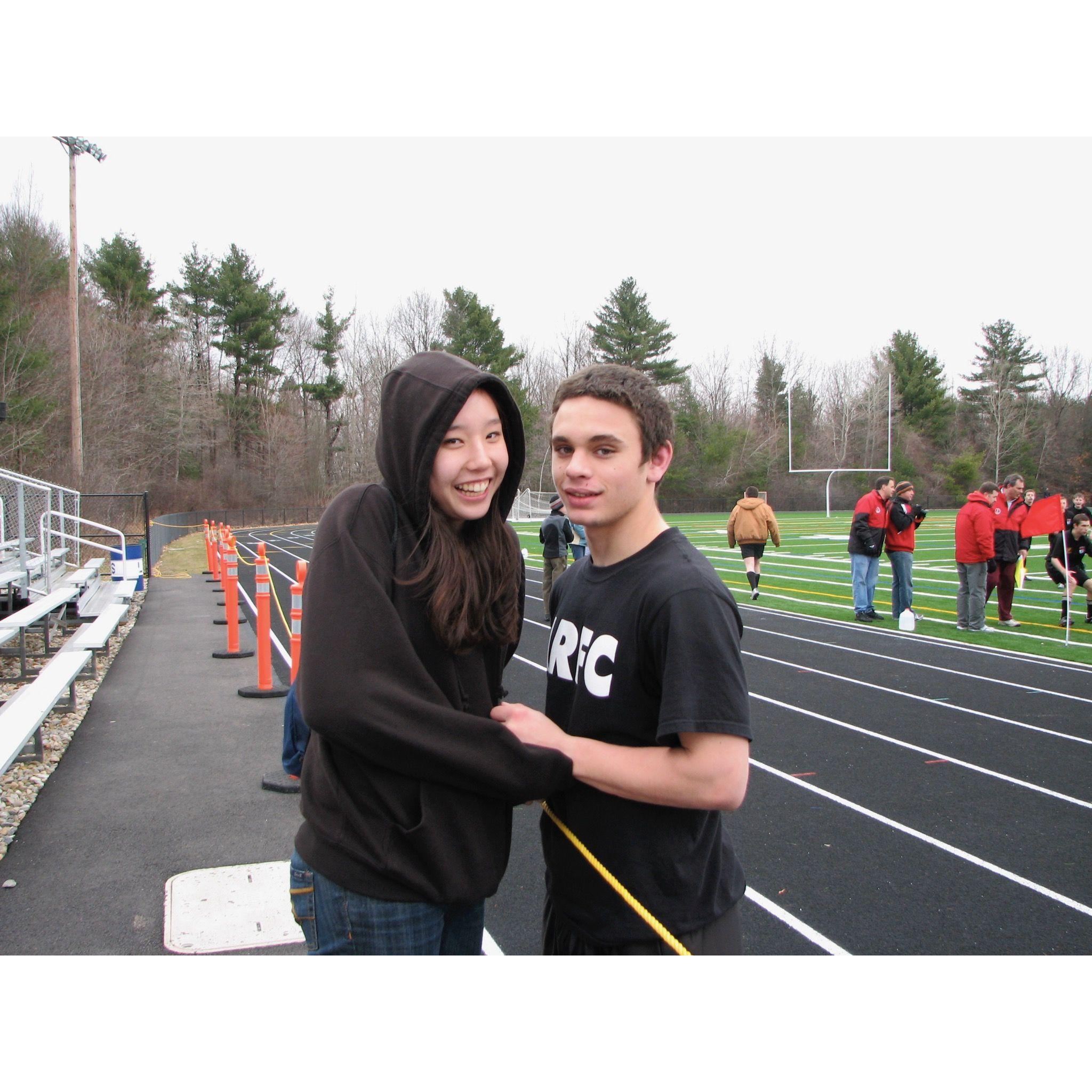 Dani supporting Matt at a Rugby game in high school.