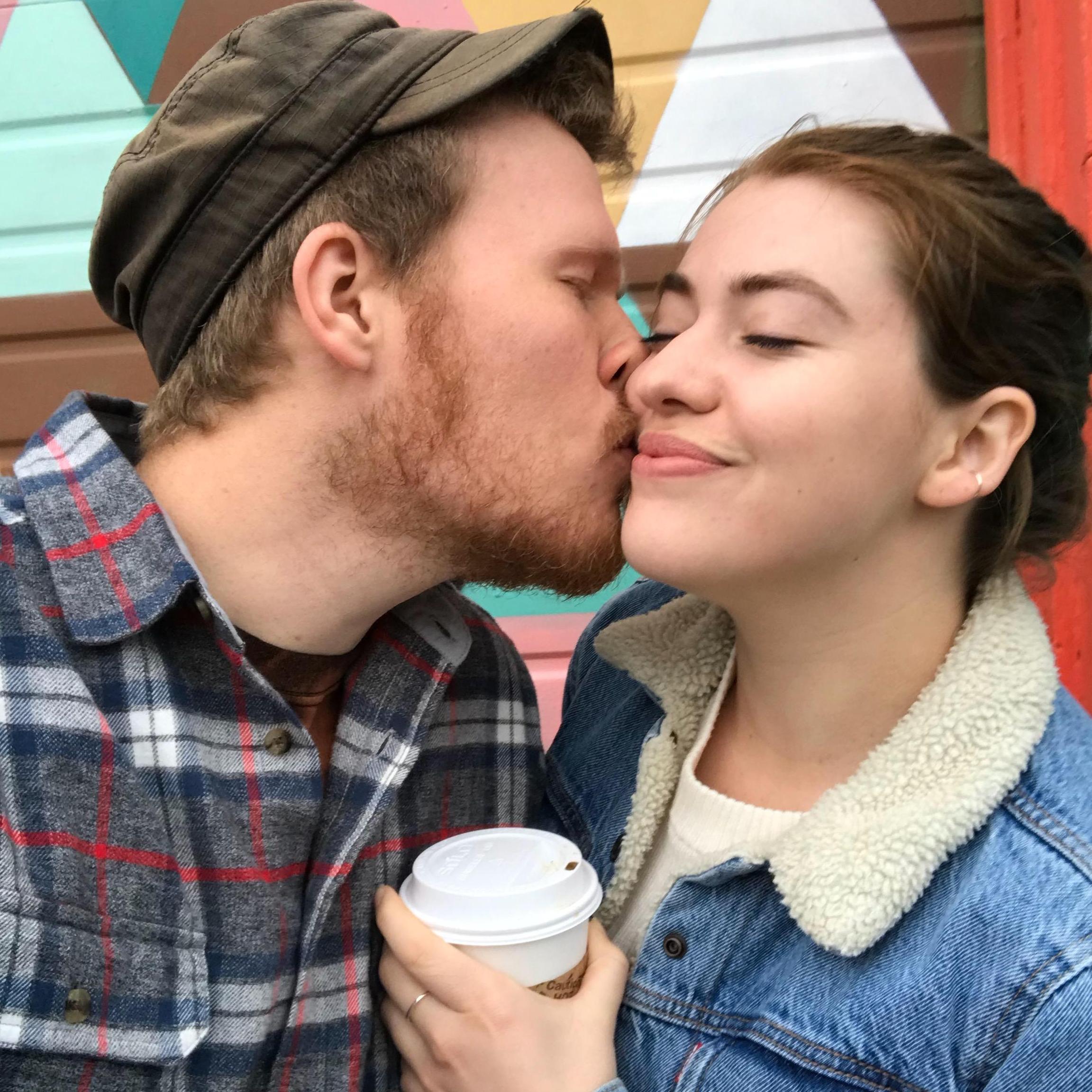 Yes, that is tea in her hands. And a cool wall in Portland behind us