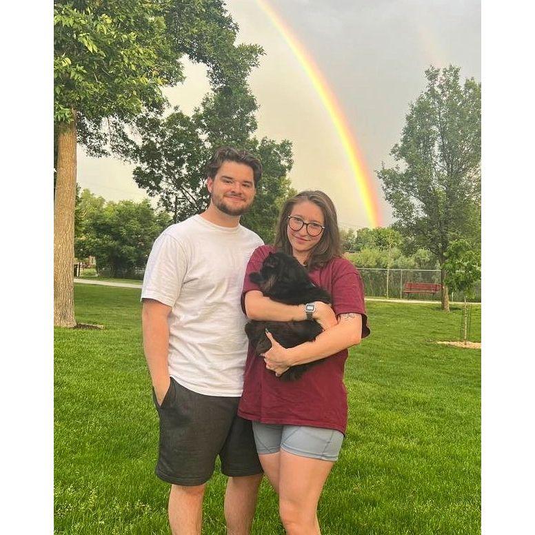 Cuddling our baby, Bo, on a neighborhood walk
