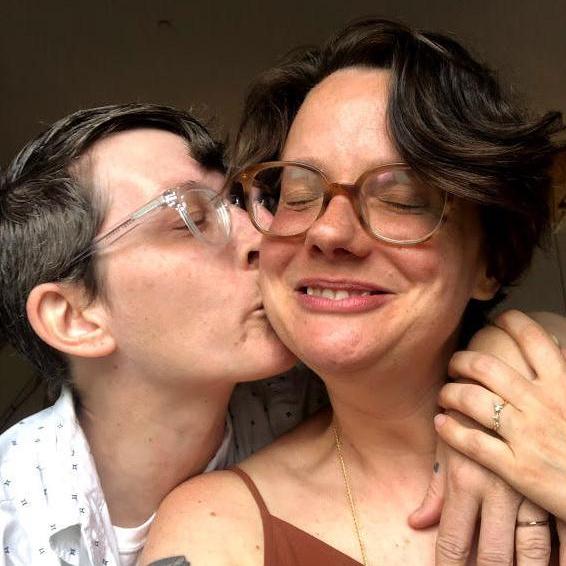 We took this photo right after proposing to one another in the Provincetown Library in 2018 <3