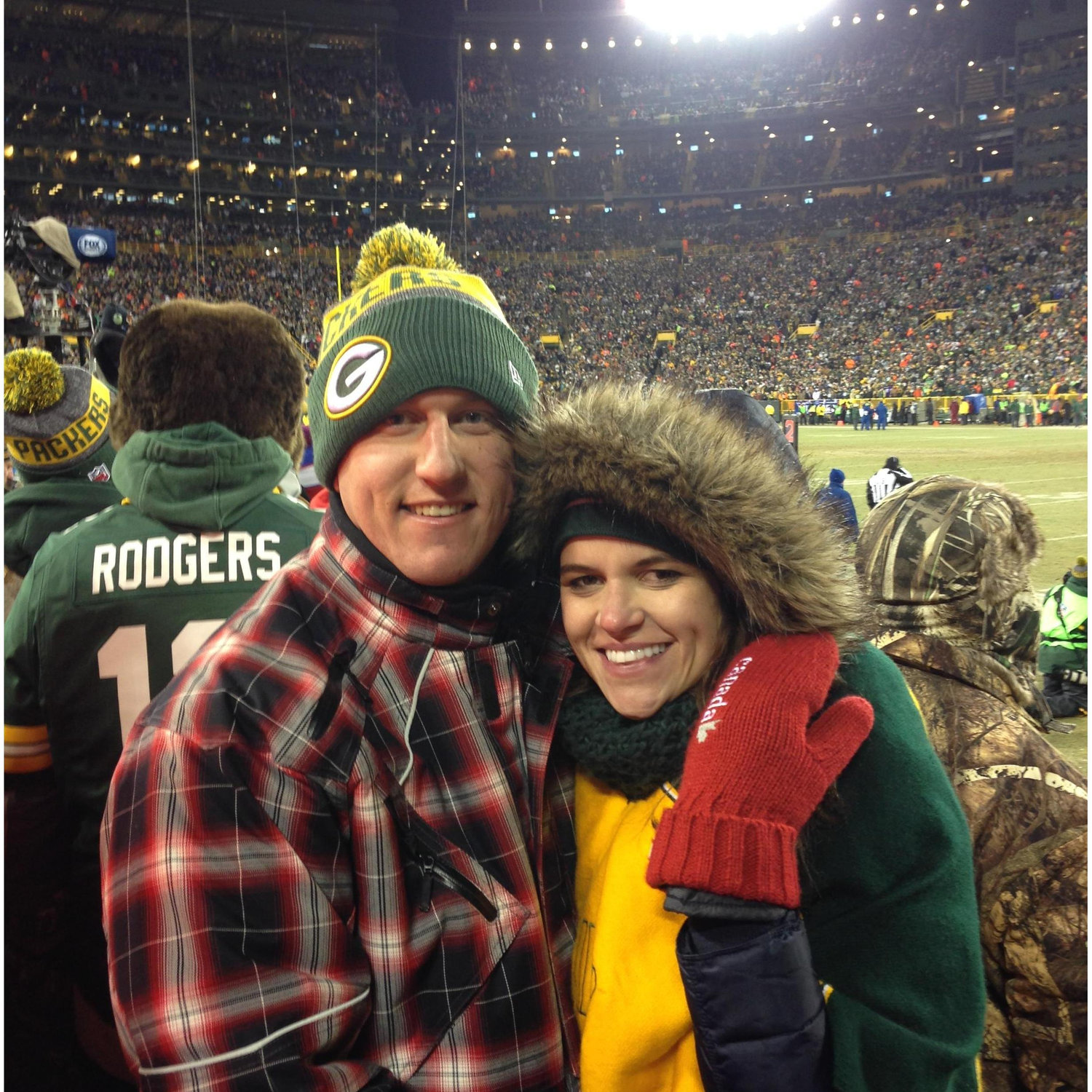 Enjoying a game in Titletown at historic Lambeau Field with Lucas and Becky Kollross.