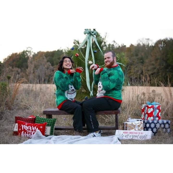 Our first Christmas Pictures together. Yes, we will be wearing these sweaters if its cold enough.