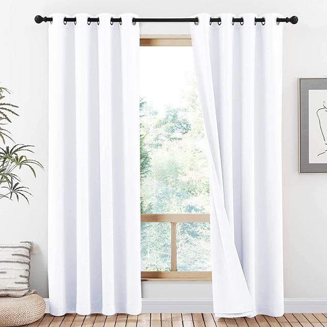 NICETOWN 100% Blackout Window Curtain Panels, Heat and Full Light Blocking Drapes with Liner for Nursery, 84 inches Drop Thermal Insulated Draperies (White, 2 Pieces, 52 inches Wide Each Panel)