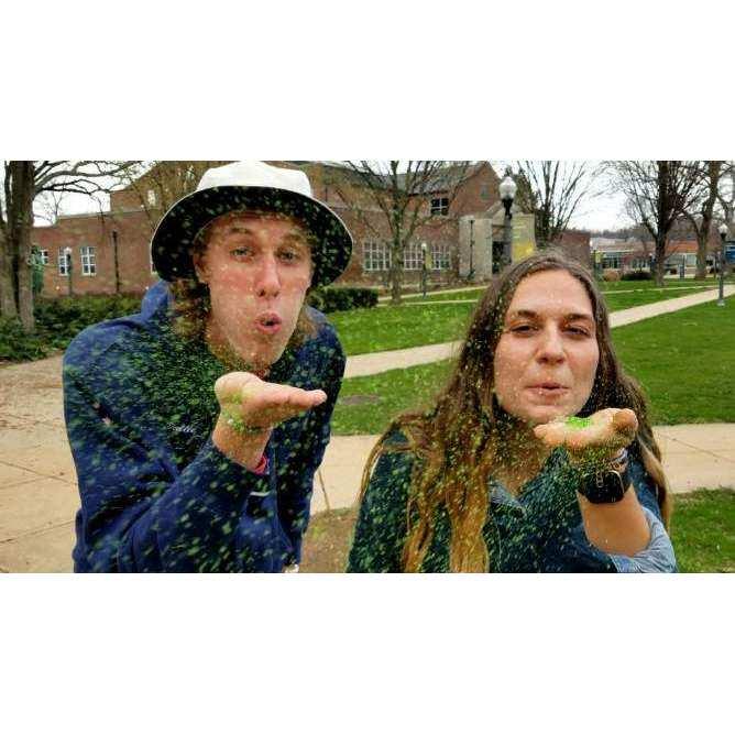 The very first picture of the two of us! Being silly and blowing glitter from an egg dyeing kit