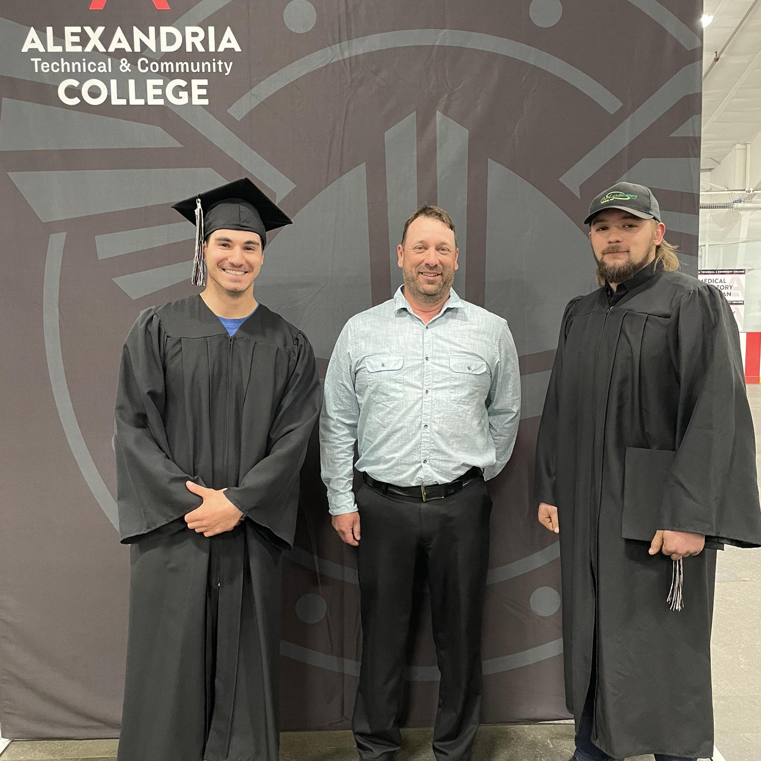Graduation day with his instructor and close friend!